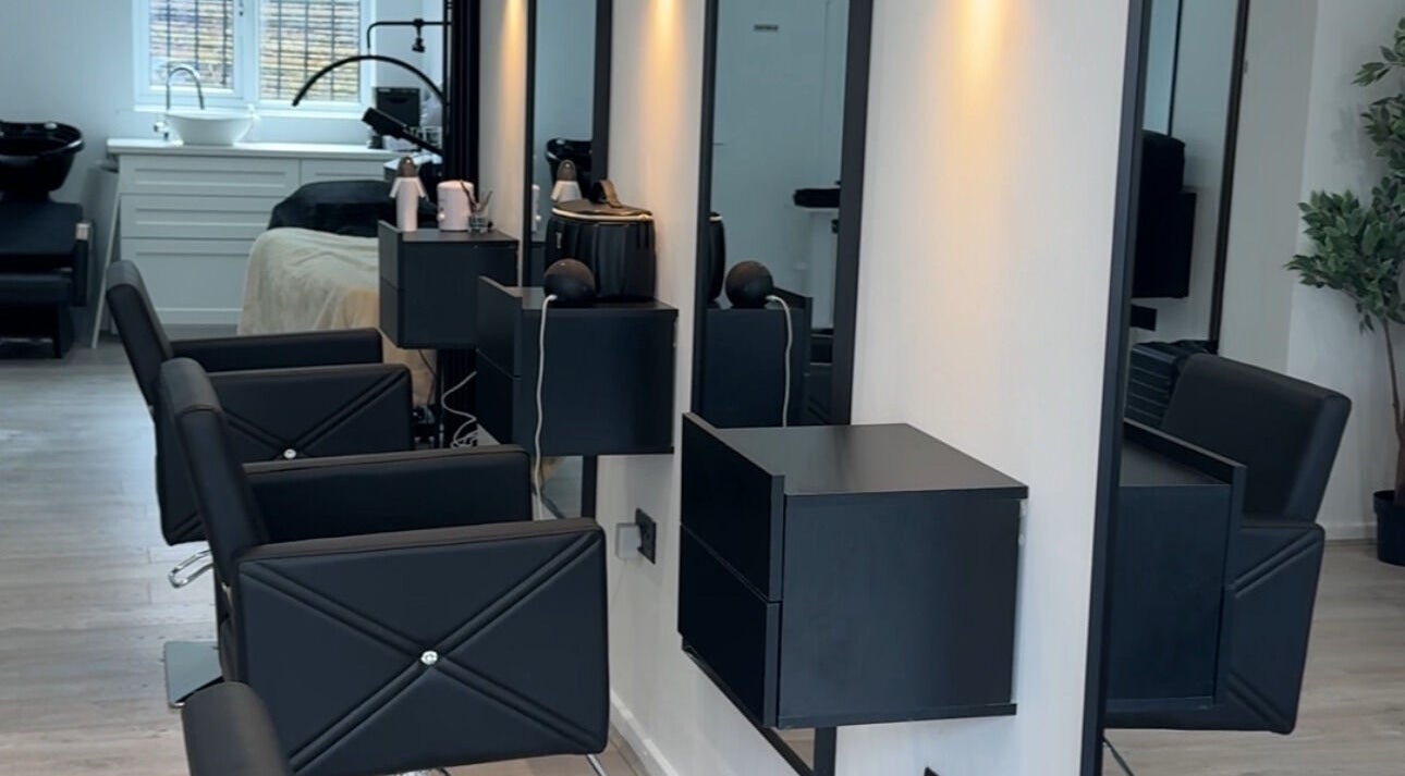Modern salon chairs and mirrors at Beauty By Tasha x in Sheffield, England, GB.