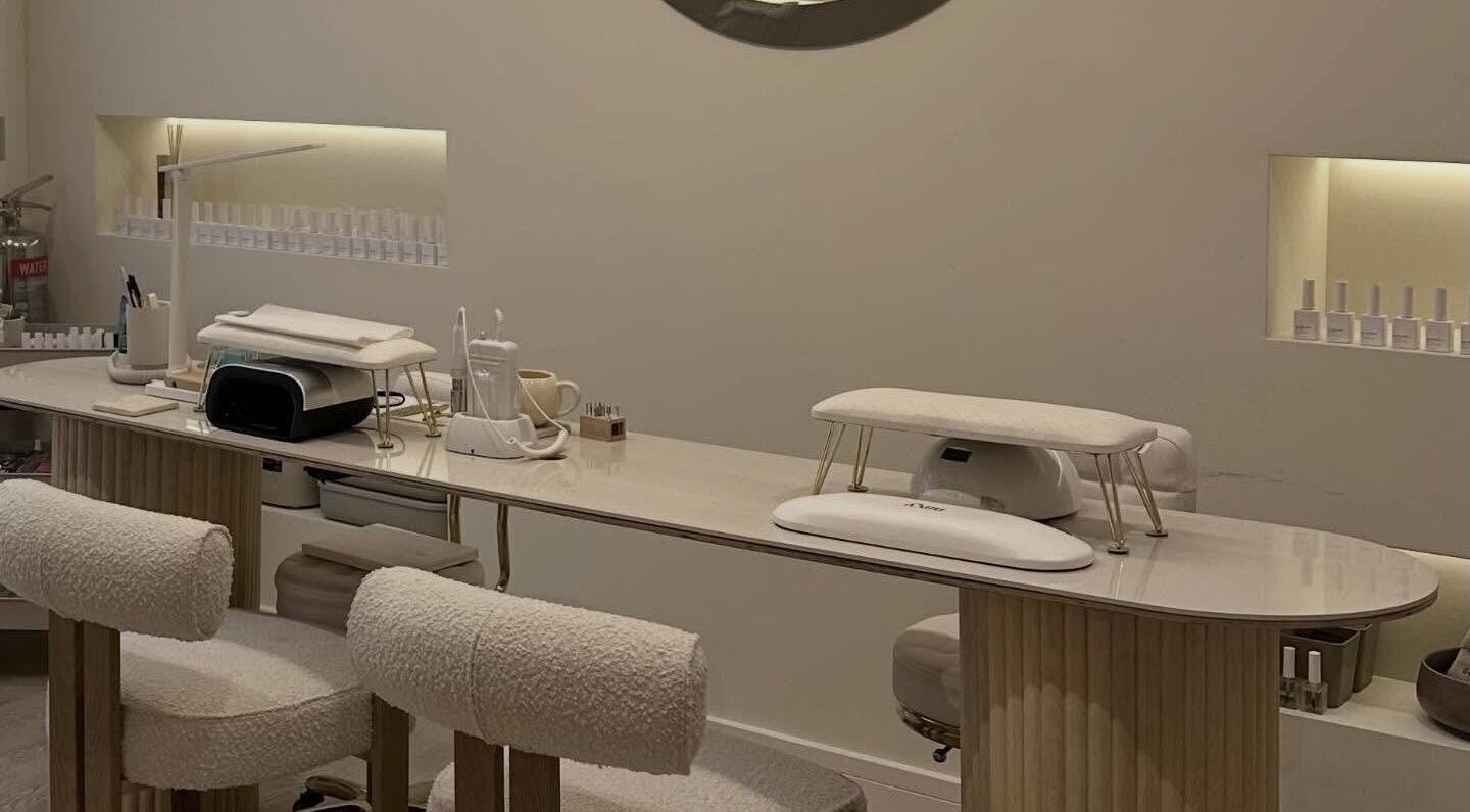 Modern nail salon at Nails By Bel, Clayton-le-woods, England, GB, featuring a sleek nail station setup.