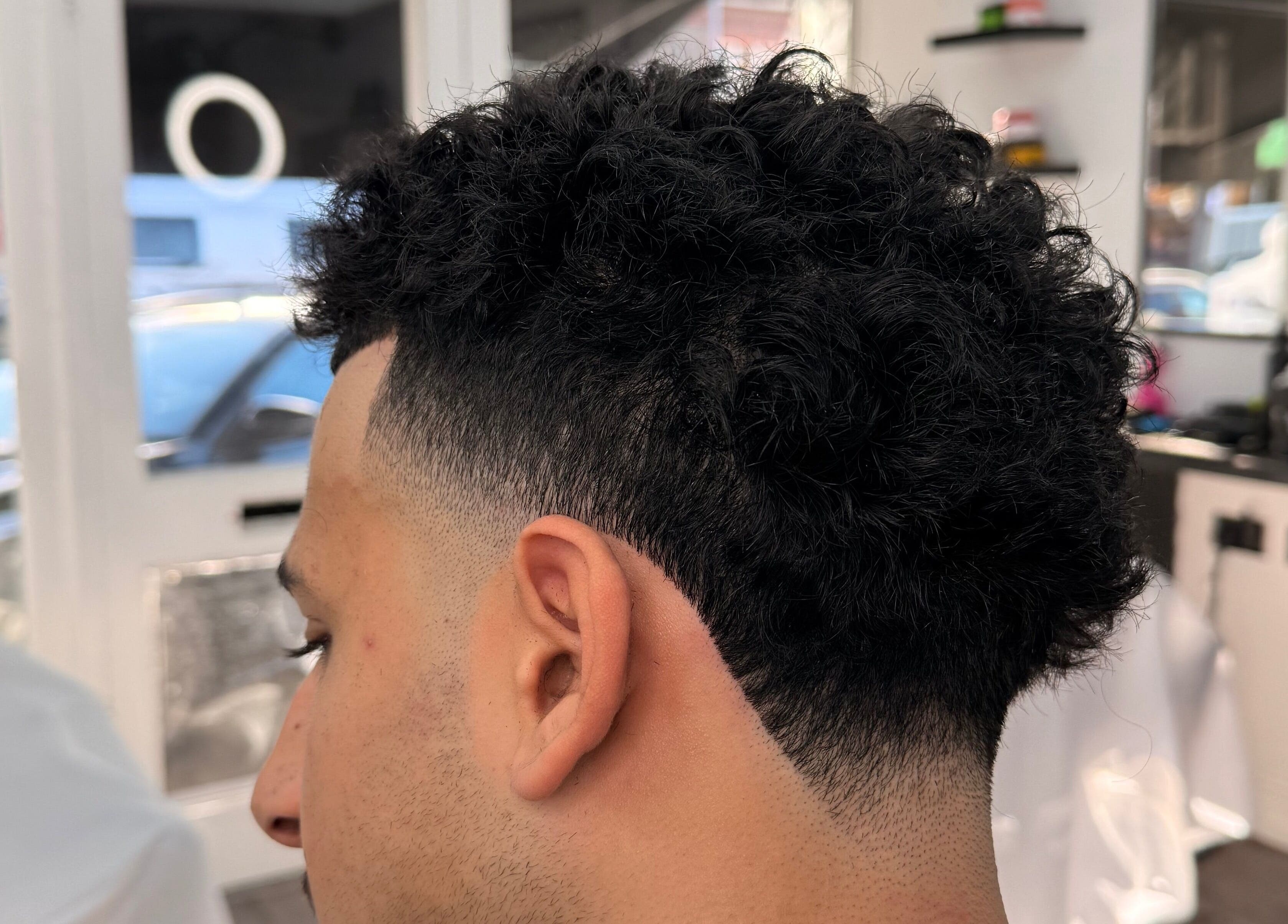 Stylish fade haircut at Dramz Cutz, Brighton And Hove, England, GB barbershop.