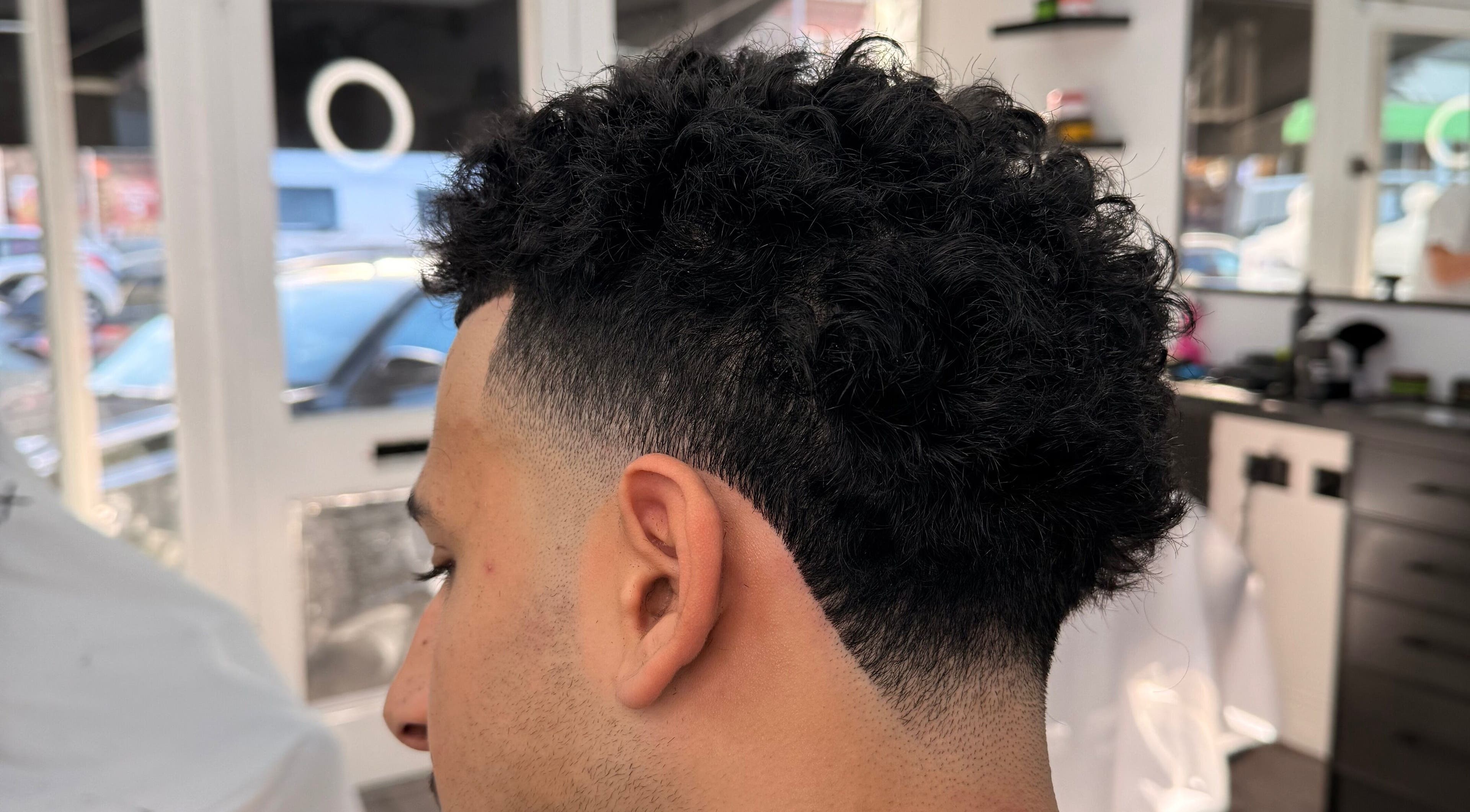 Stylish fade haircut at Dramz Cutz, Brighton And Hove, England, GB barbershop.