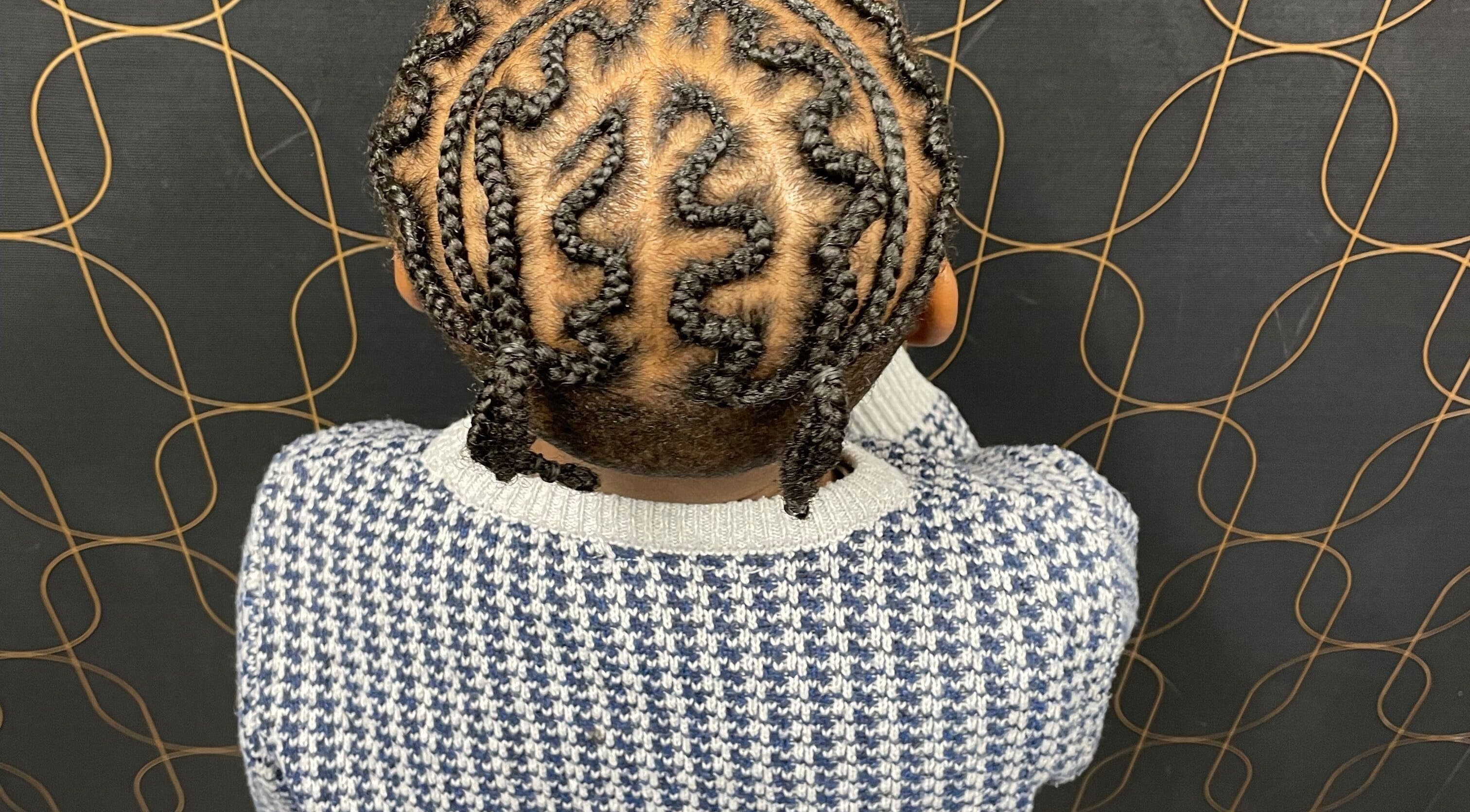 Stylish braided hairstyle showcased in Catford, London, England, GB, highlighting unique braid patterns.