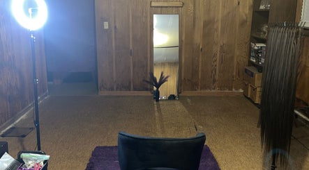 Interior of Braids by Pii, Georgia, Georgia, US. Features mirror, chair, and styling tools.