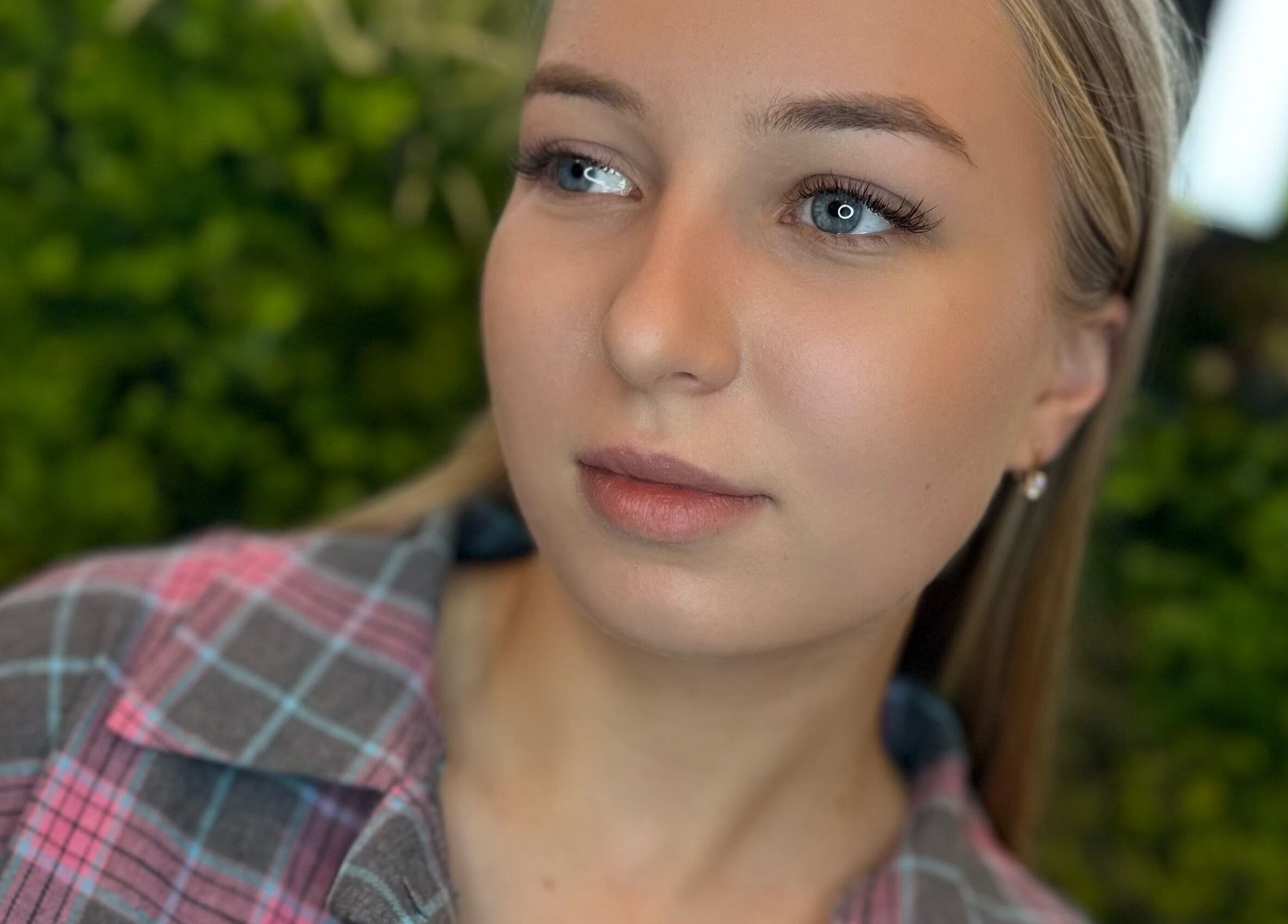 Close-up of a serene woman with eyelashes by Frances Lash Art, Vancouver, British Columbia, CA.