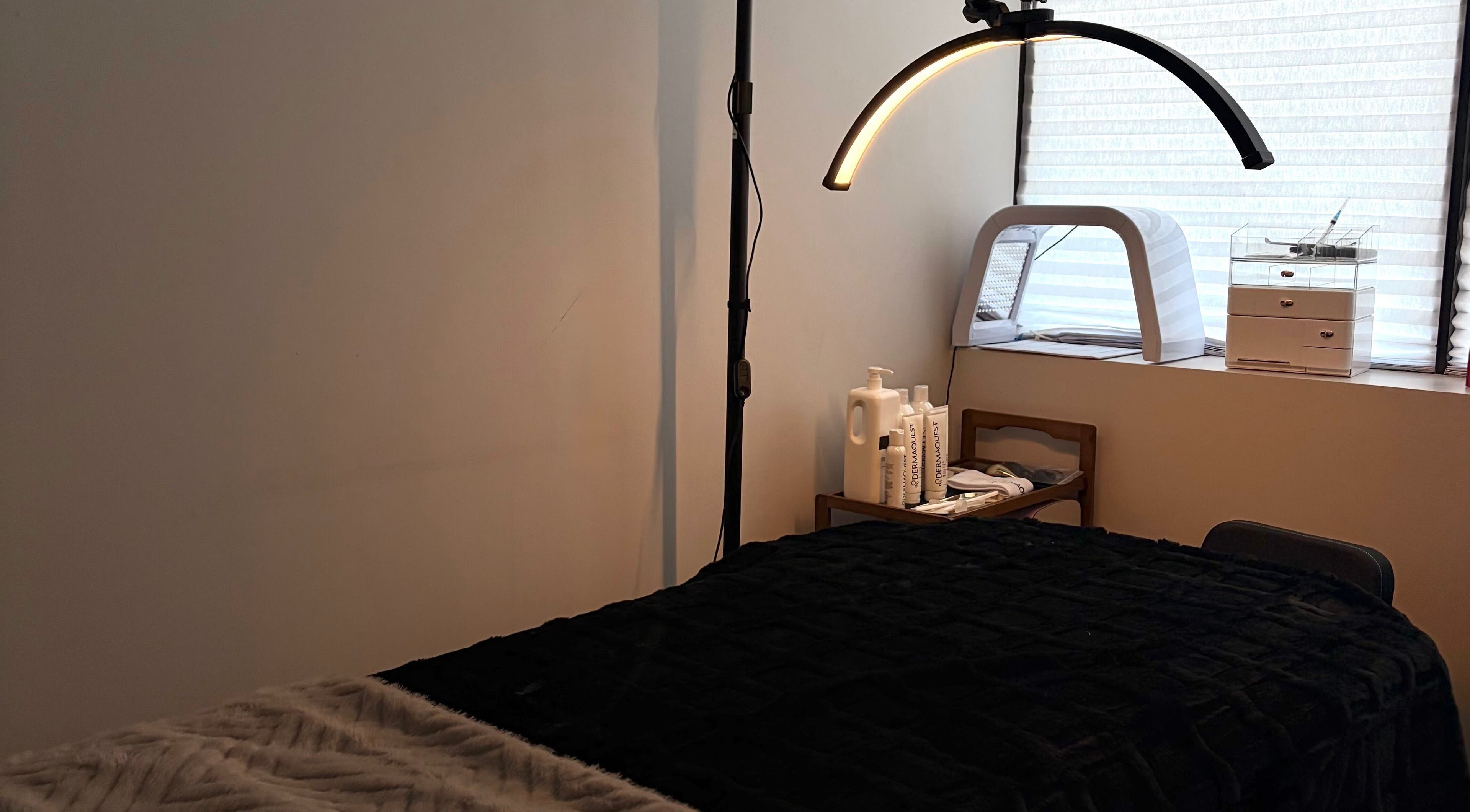 Cozy treatment room at Mkytheskindiary, Vaughan, Ontario, CA with a massage table and spa tools.