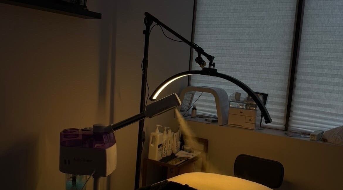 Spa room with treatment setup at Mkytheskindiary, Vaughan, Ontario, CA. Soft lighting and equipment create a calming ambiance.