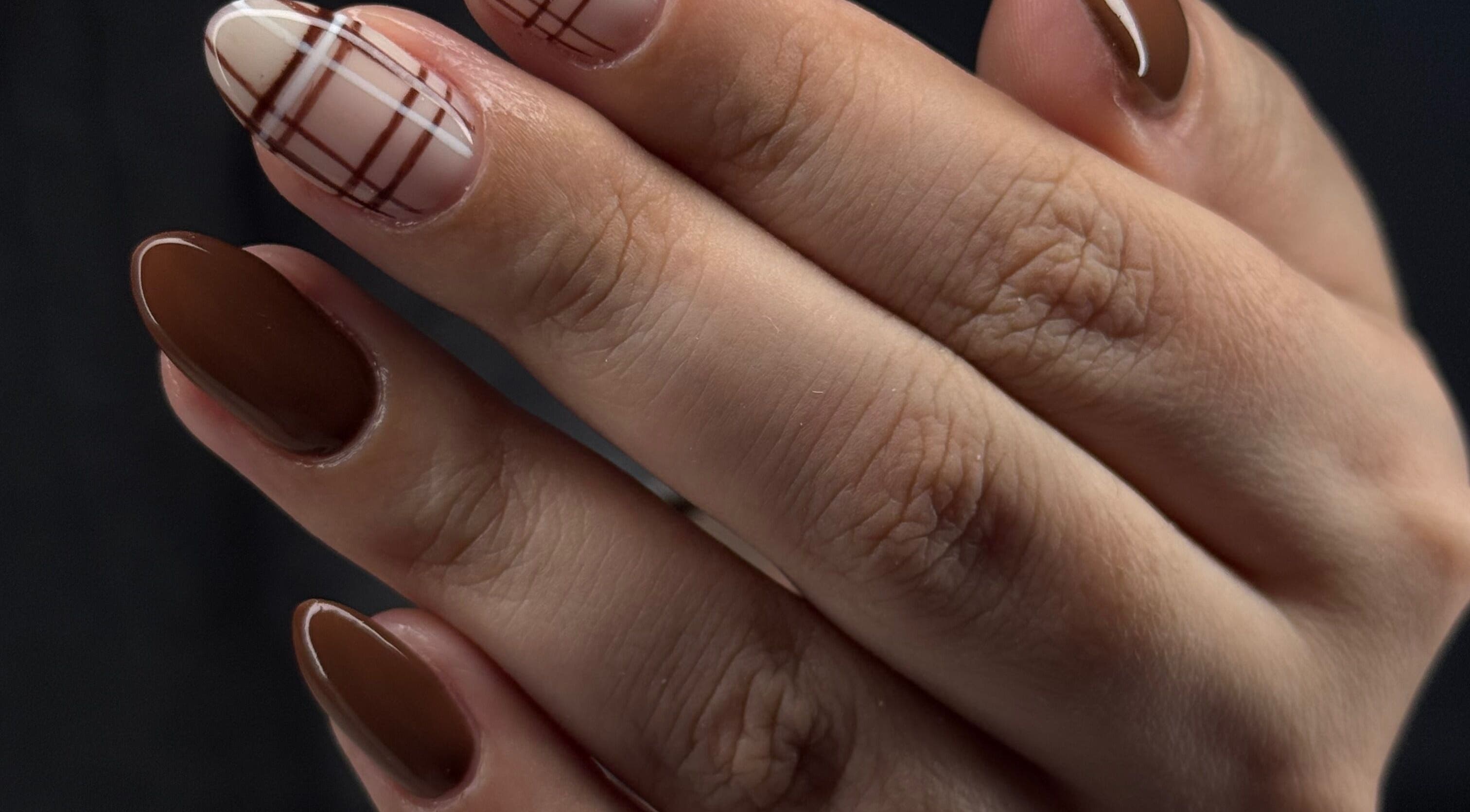 Stylish plaid nail art in brown and nude by nailsby_agnes, Glendale, California, US.