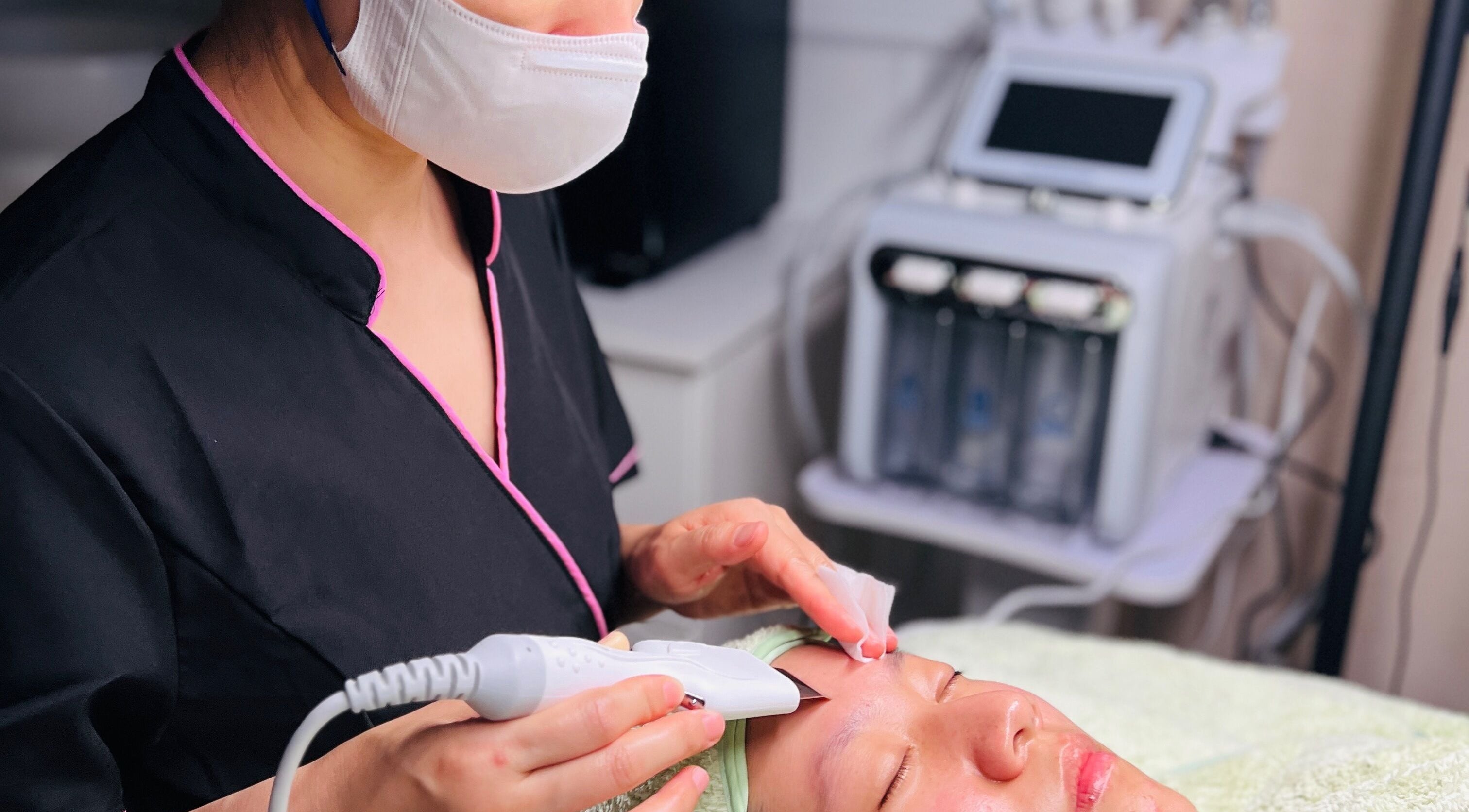 Facial treatment at Adore.Facial in Hawthorne, Queensland, AU. Aesthetician uses a modern device.