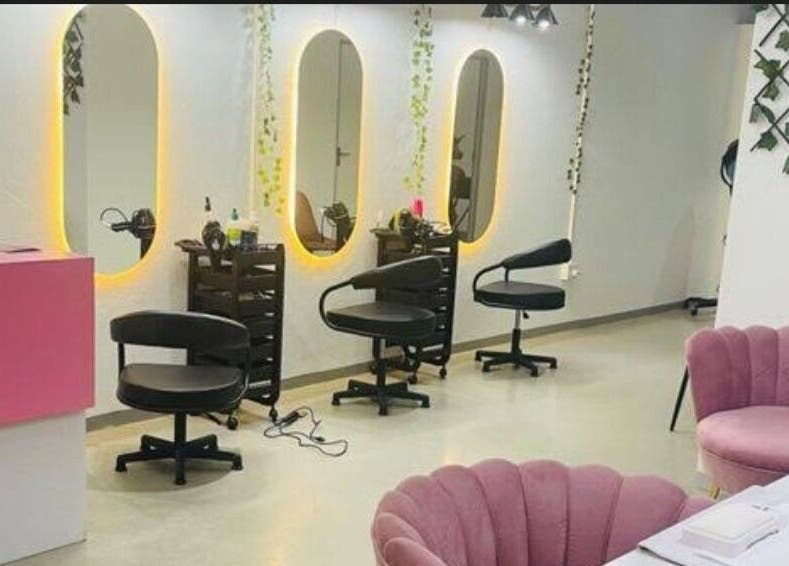Modern salon interior at Revive beauty salon, Pimpri-Chinchwad, Maharashtra, IN, with stylish mirrors and seating.
