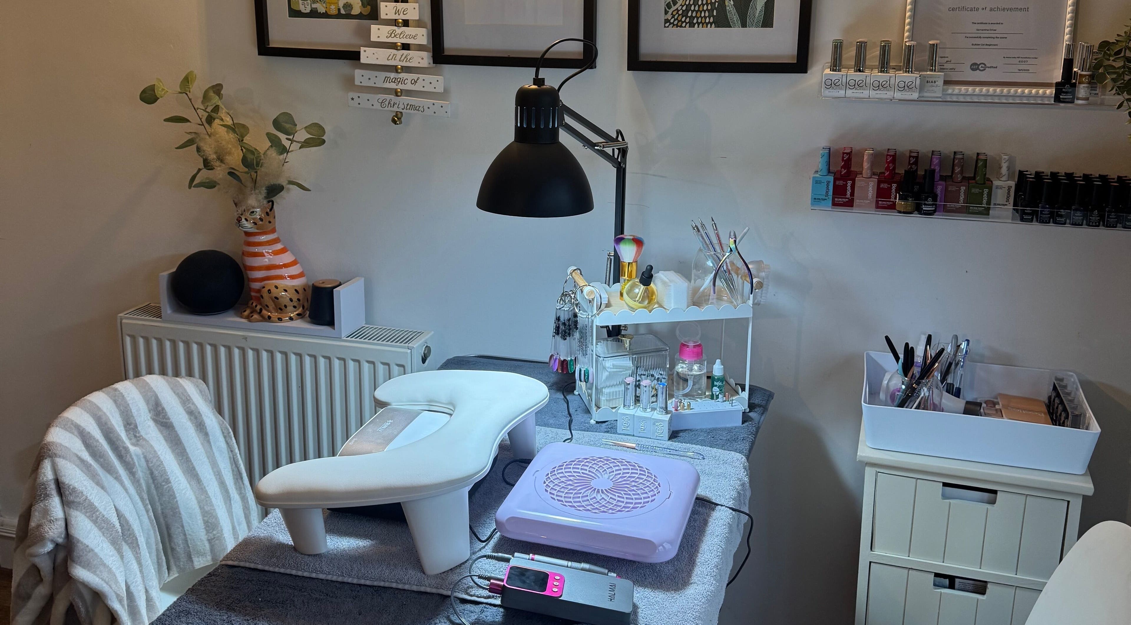 Cozy nail treatment setup at BIAB beauty bar, Bradwell, England, GB. Modern and inviting decor.