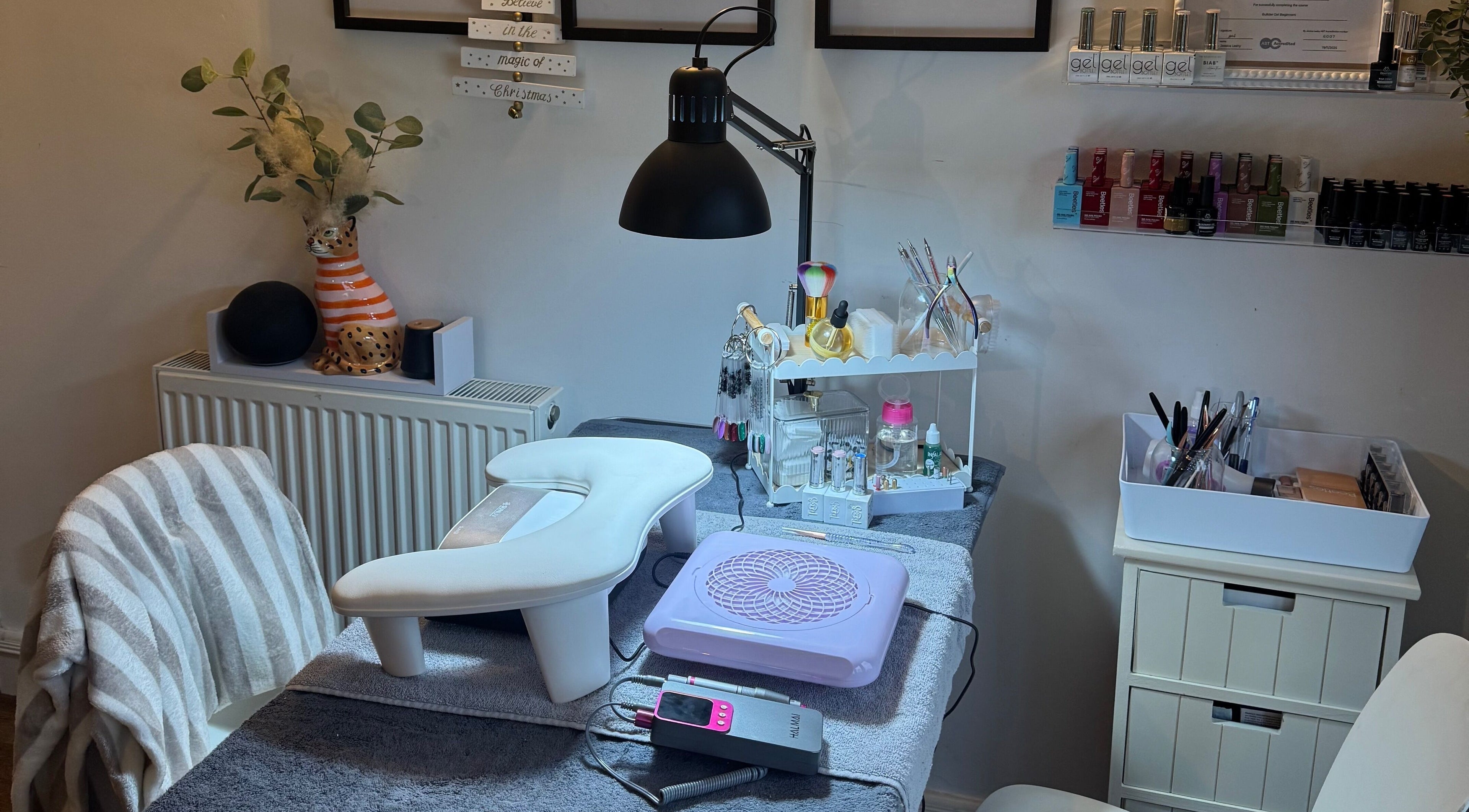 Cozy nail care station at BIAB Beauty Bar, Bradwell, England, GB. Well-equipped with tools and elegant decor.