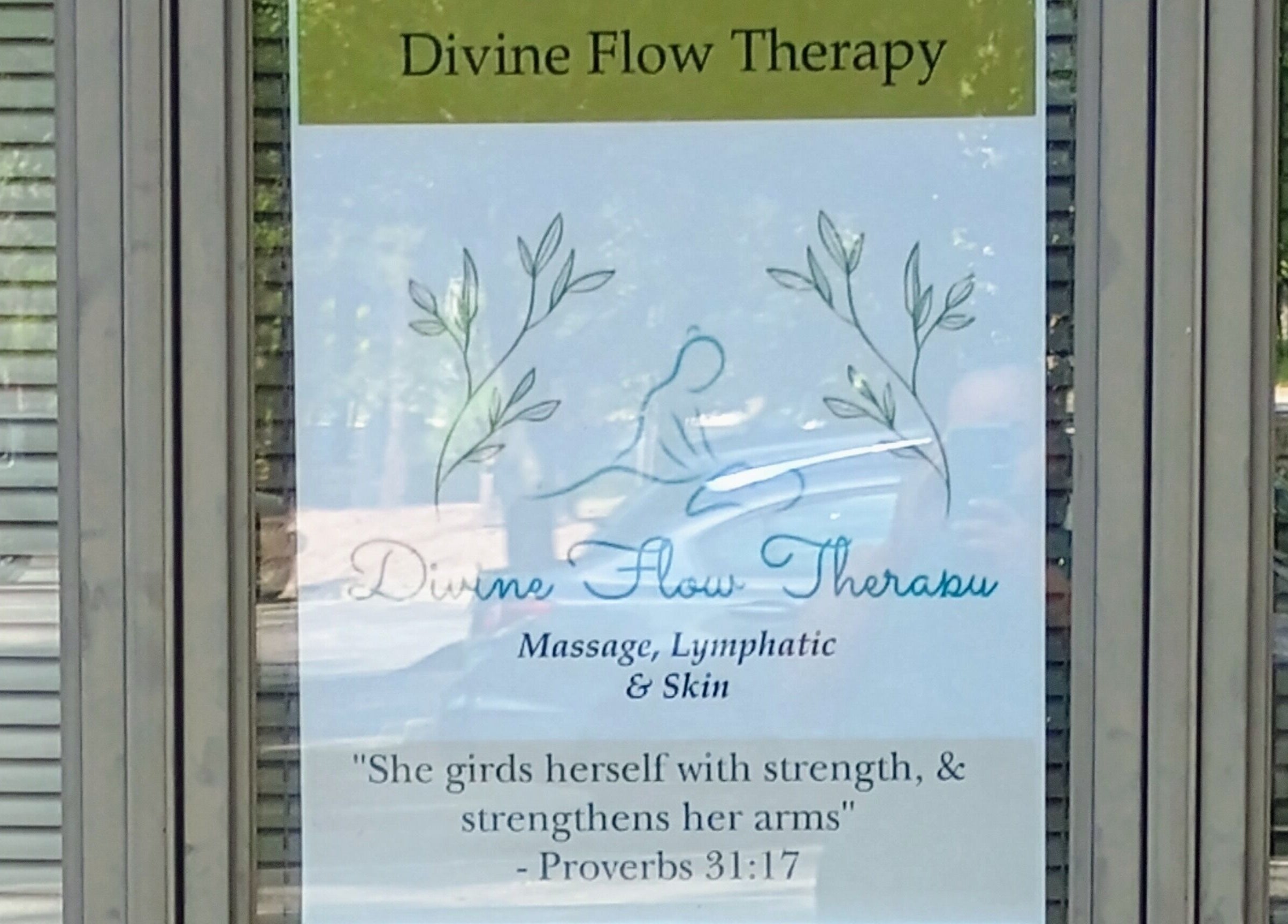 Sign at Divine Flow Therapy offering massage and skincare in Gibbsboro, New Jersey, US.