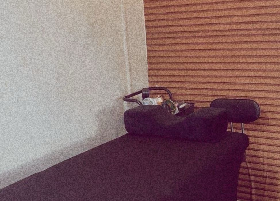 Massage bed in a tranquil room at Beauty by Kiraa, Lagos, Lagos, NG, ideal for relaxation and wellness.