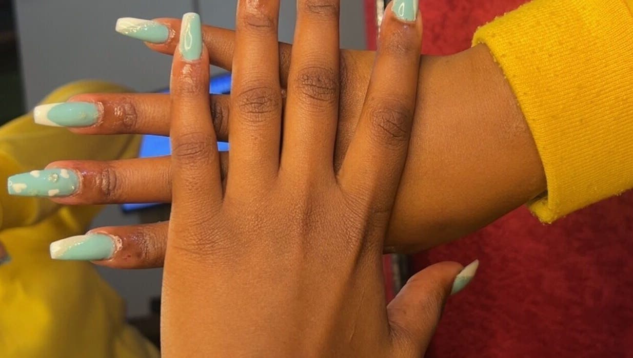 Mint green nail art at CANDIA BEAUTY, Nairobi, Nairobi County, KE, showcases detailed and stylish manicure.