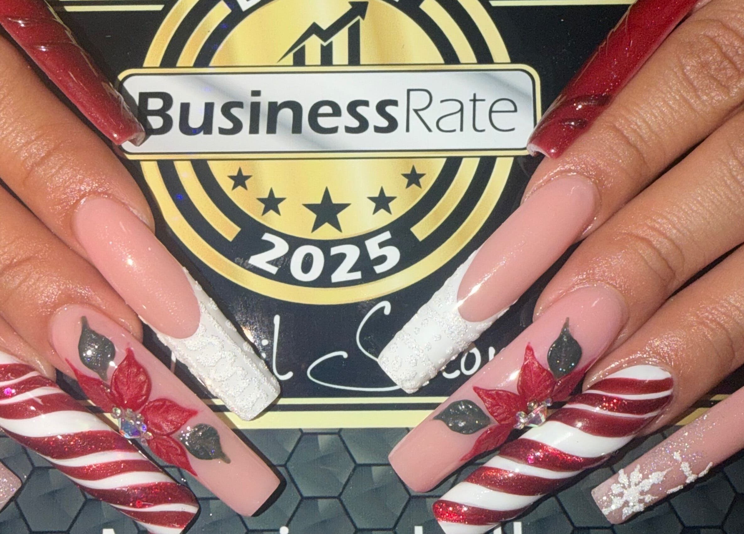 Christmas-themed nail art at 2K Nails Spa in Los Angeles, California, US showcasing intricate designs.