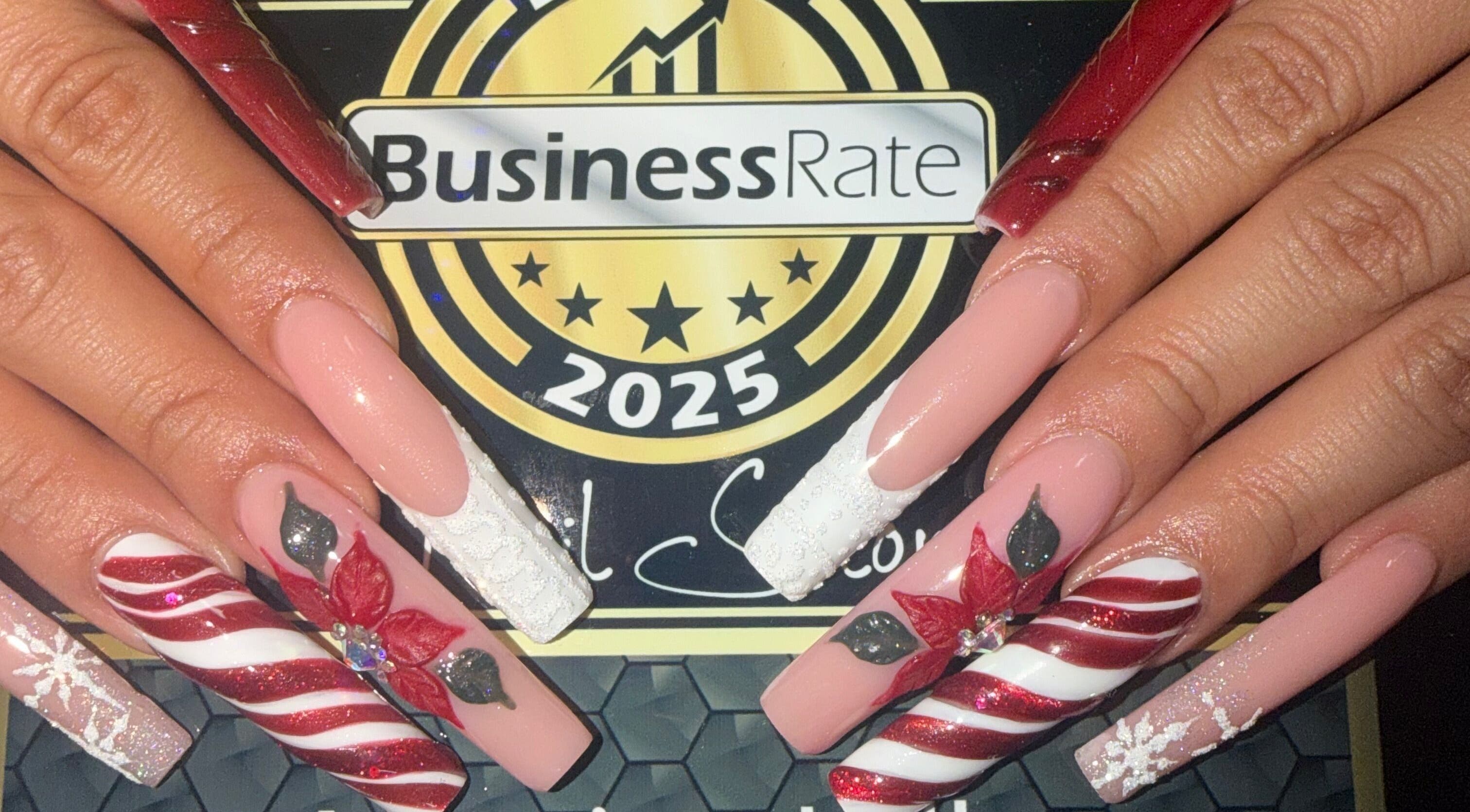 Christmas-themed nail art at 2K Nails Spa in Los Angeles, California, US showcasing intricate designs.