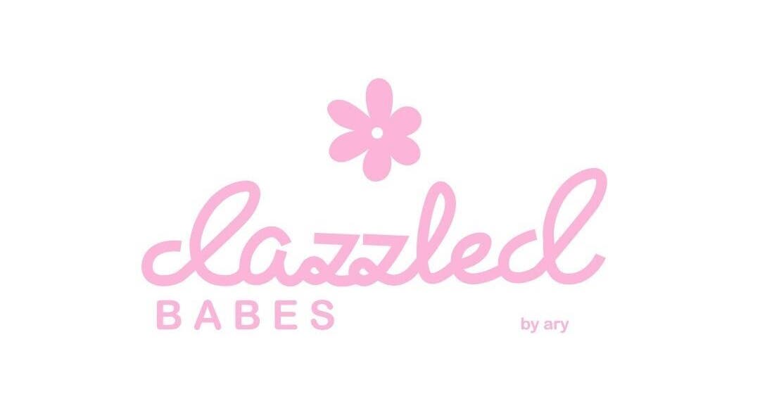Logotipo de Dazzled Babes con flor rosa, ubicado en Ciudad Nicolás Romero, Estado De México, MX.