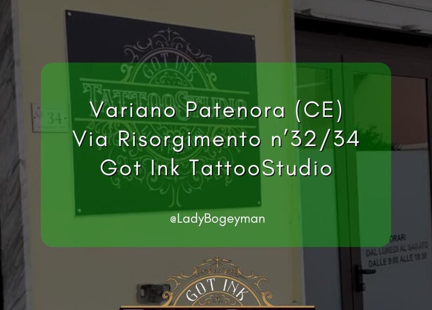 Ingresso di Got Ink Tattoo a Marzanello, Campania, IT, con insegna verde e info.