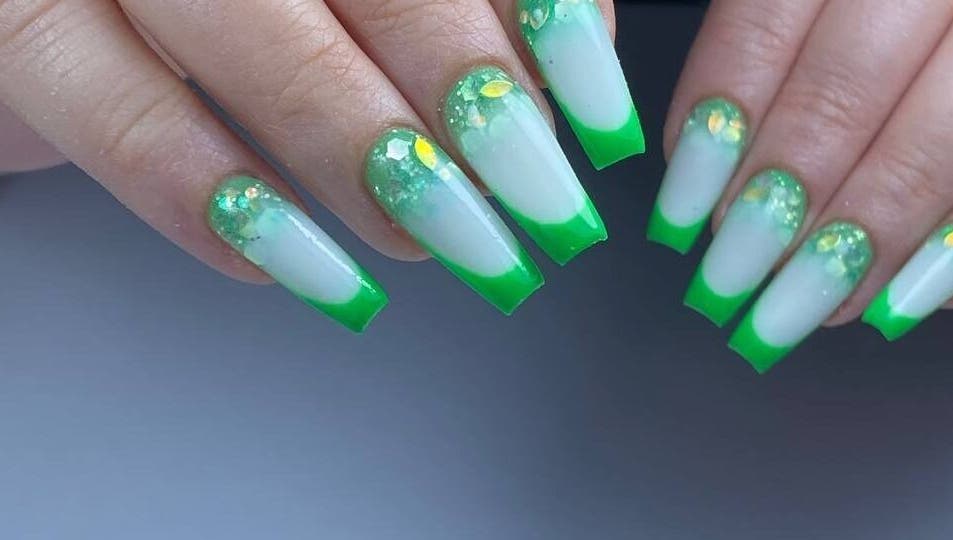 Stylish neon green nails with glitter from Hadis nail, Sydney, New South Wales, AU.