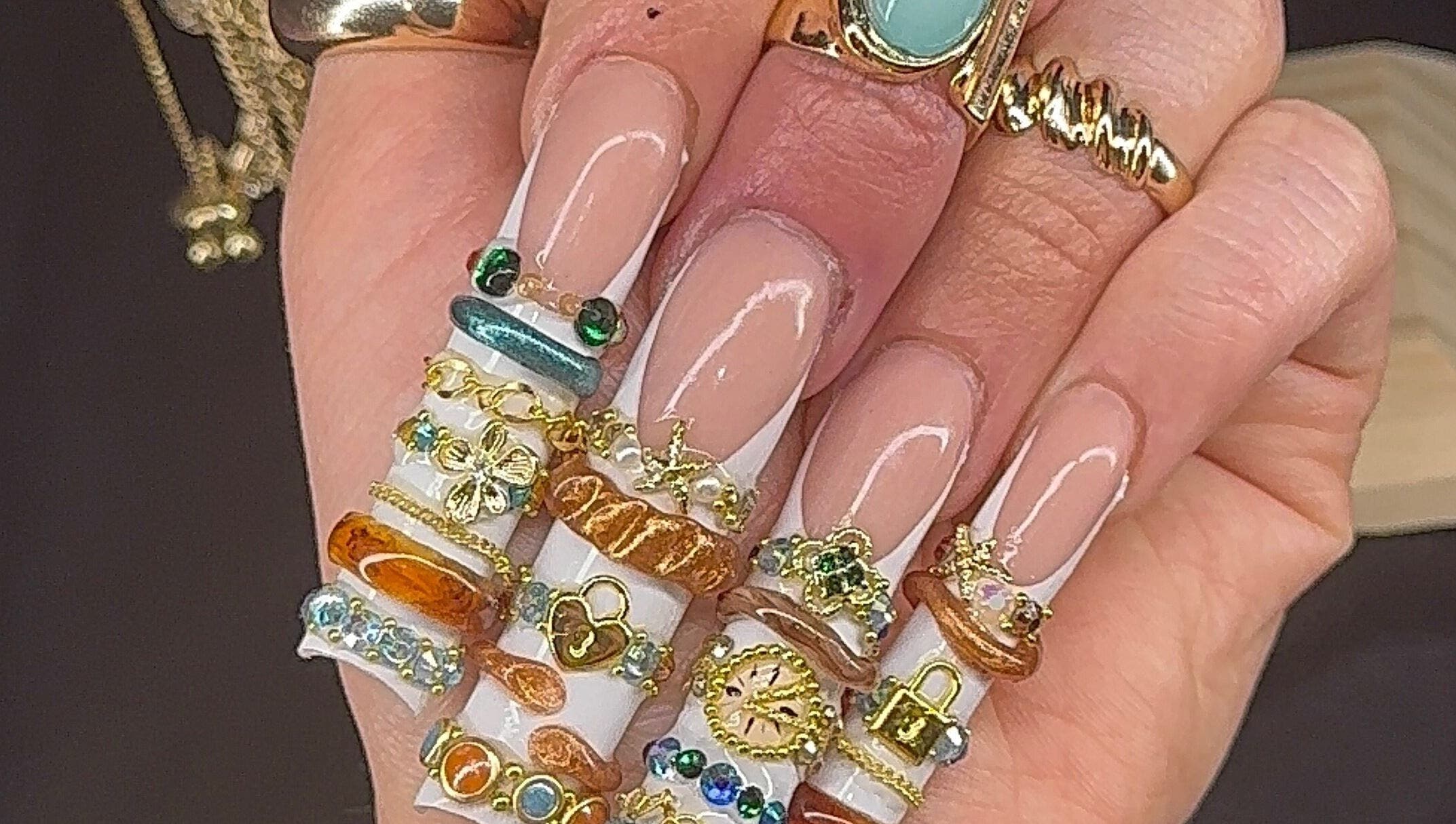 Intricate nail art with gold and gem accents at Prettynpolished, Bell Post Hill, Victoria, AU.