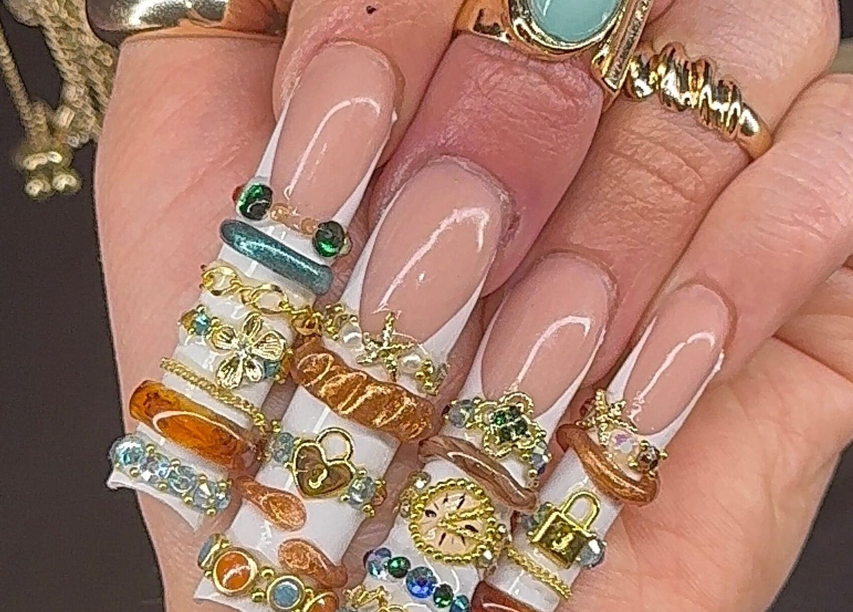 Intricate nail art with gold and gem accents at Prettynpolished, Bell Post Hill, Victoria, AU.