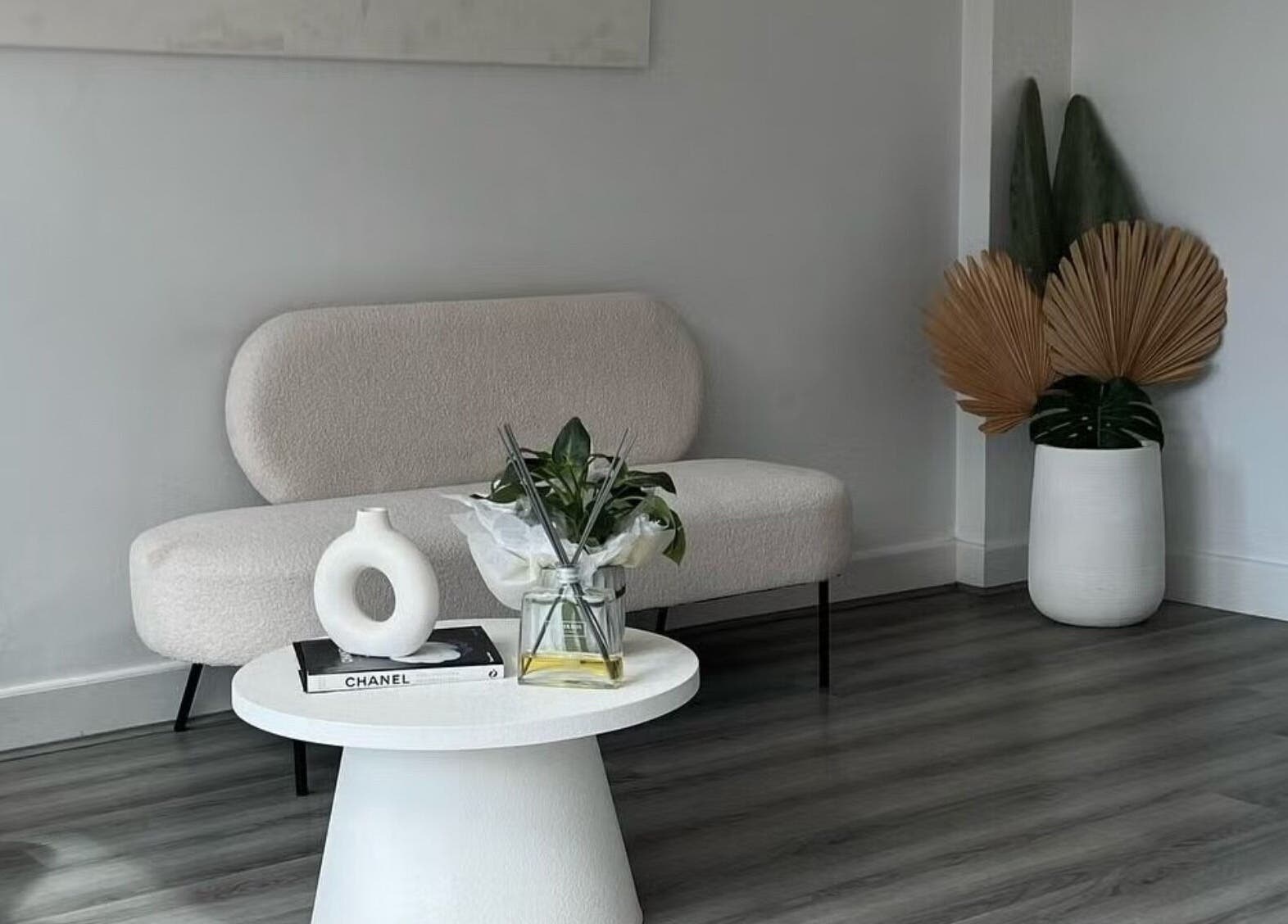 Elegant waiting area at Lumi Whitening, Melbourne, Victoria, AU with chic decor and modern furniture.