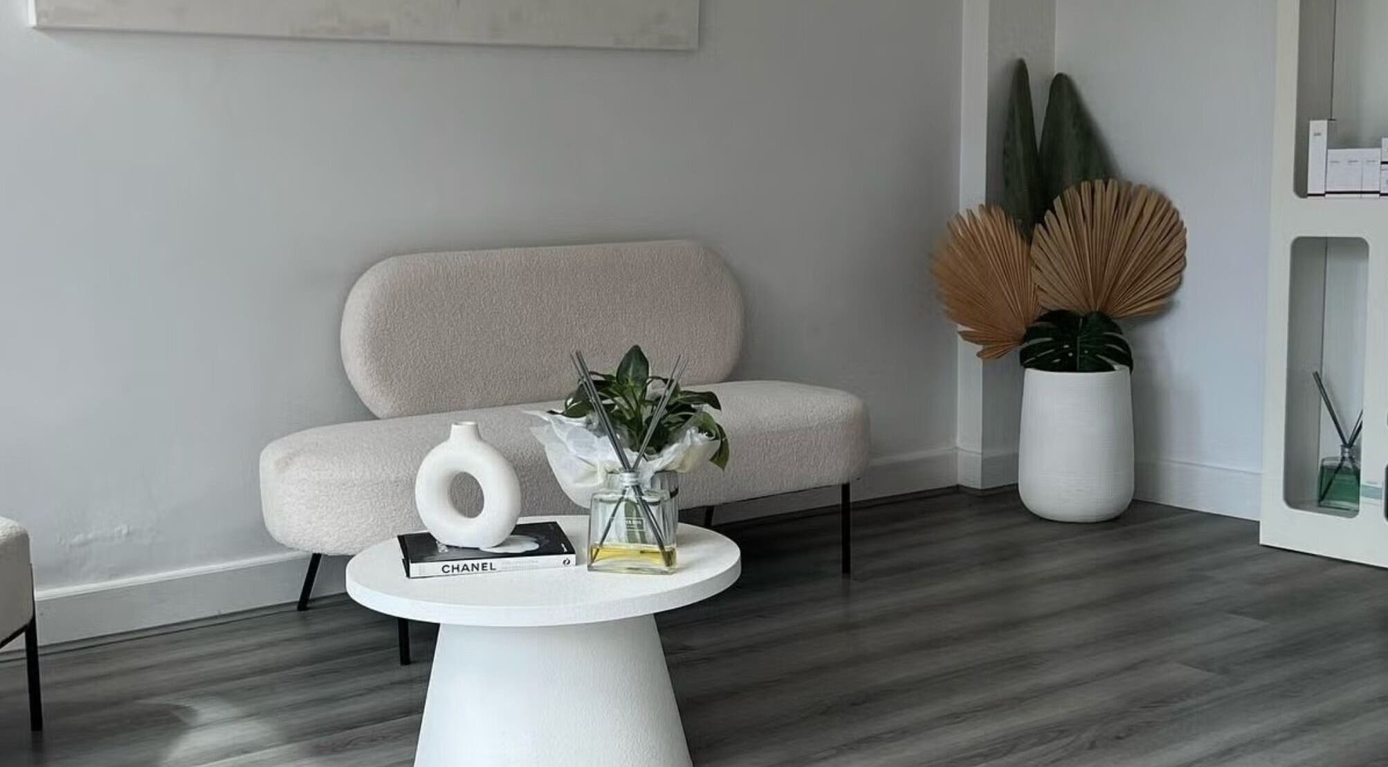 Elegant waiting area at Lumi Whitening, Melbourne, Victoria, AU with chic decor and modern furniture.