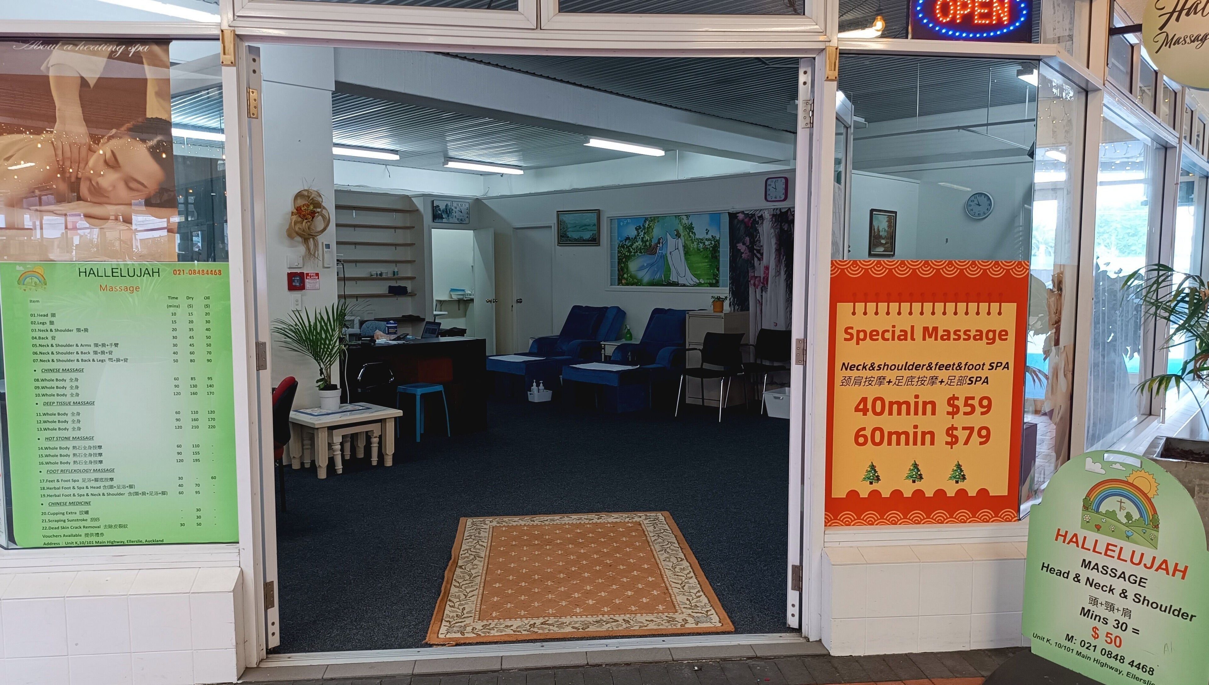 Entrance of Harmony River @ Ellerslie (Hallelujah Massage), Auckland, NZ, with price list and welcoming decor.