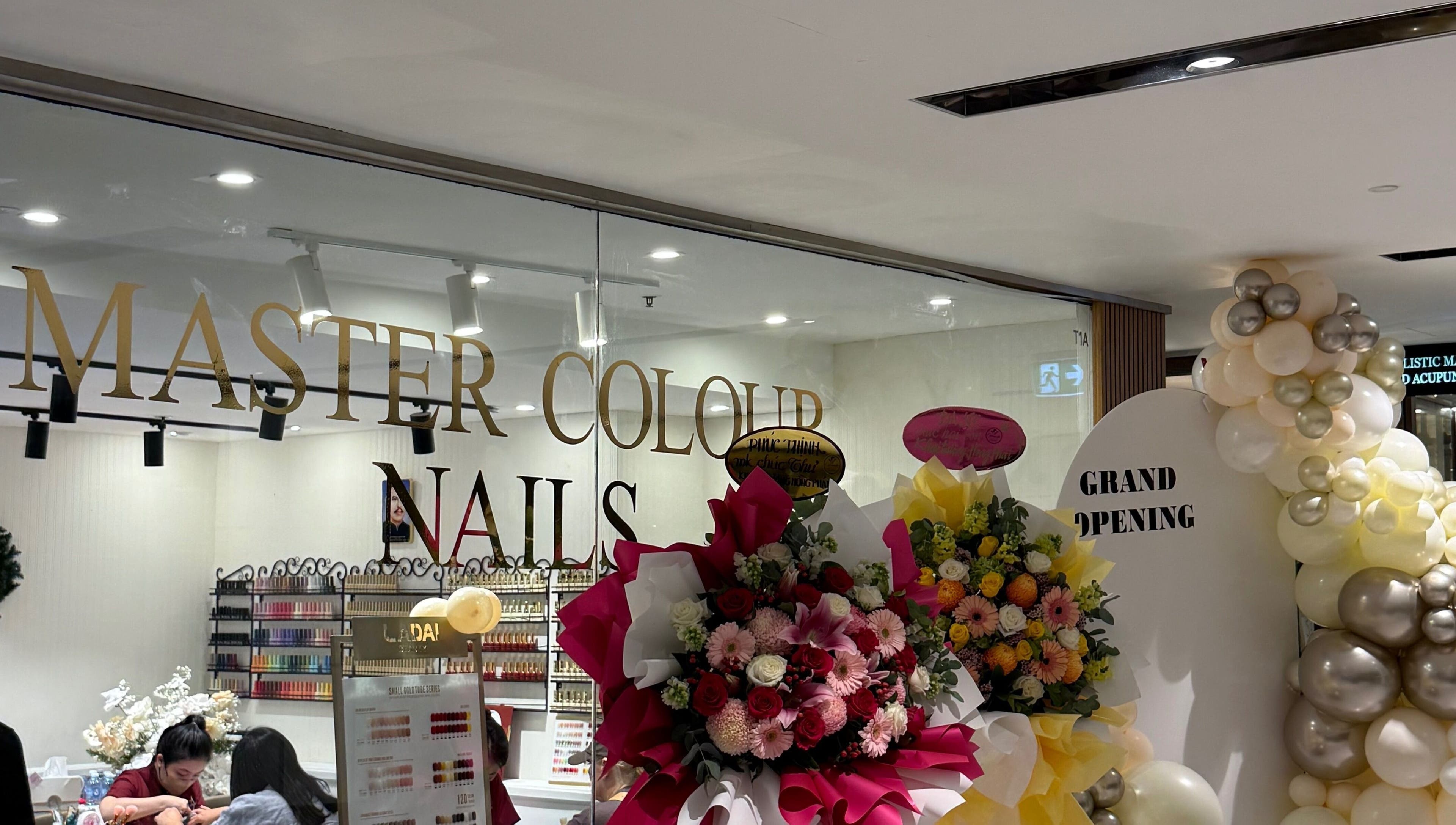 Grand opening of Master Colour Nails in Sydney, New South Wales, AU with floral decor and vibrant ambiance.