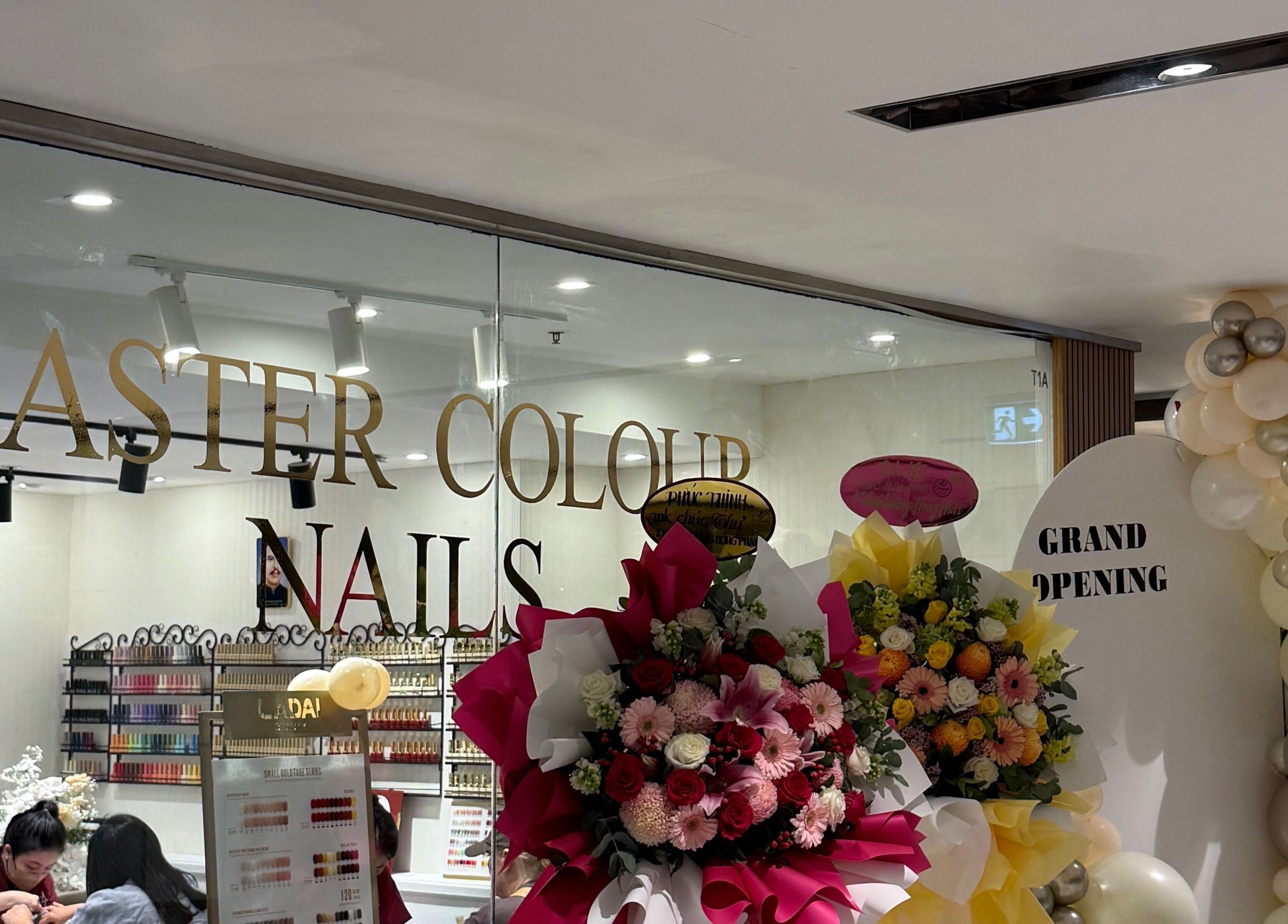 Grand opening of Master Colour Nails in Sydney, New South Wales, AU with floral decor and vibrant ambiance.