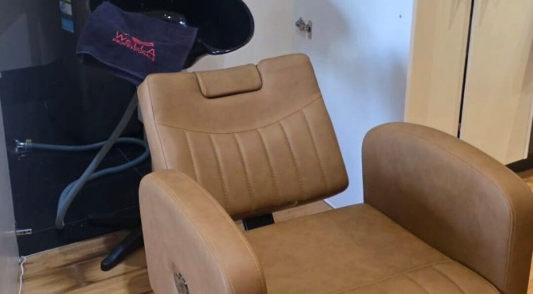 Elegant salon chair and wash basin at Jocelyn Hair Xo, Melbourne, AU, ideal for premium hair treatments.