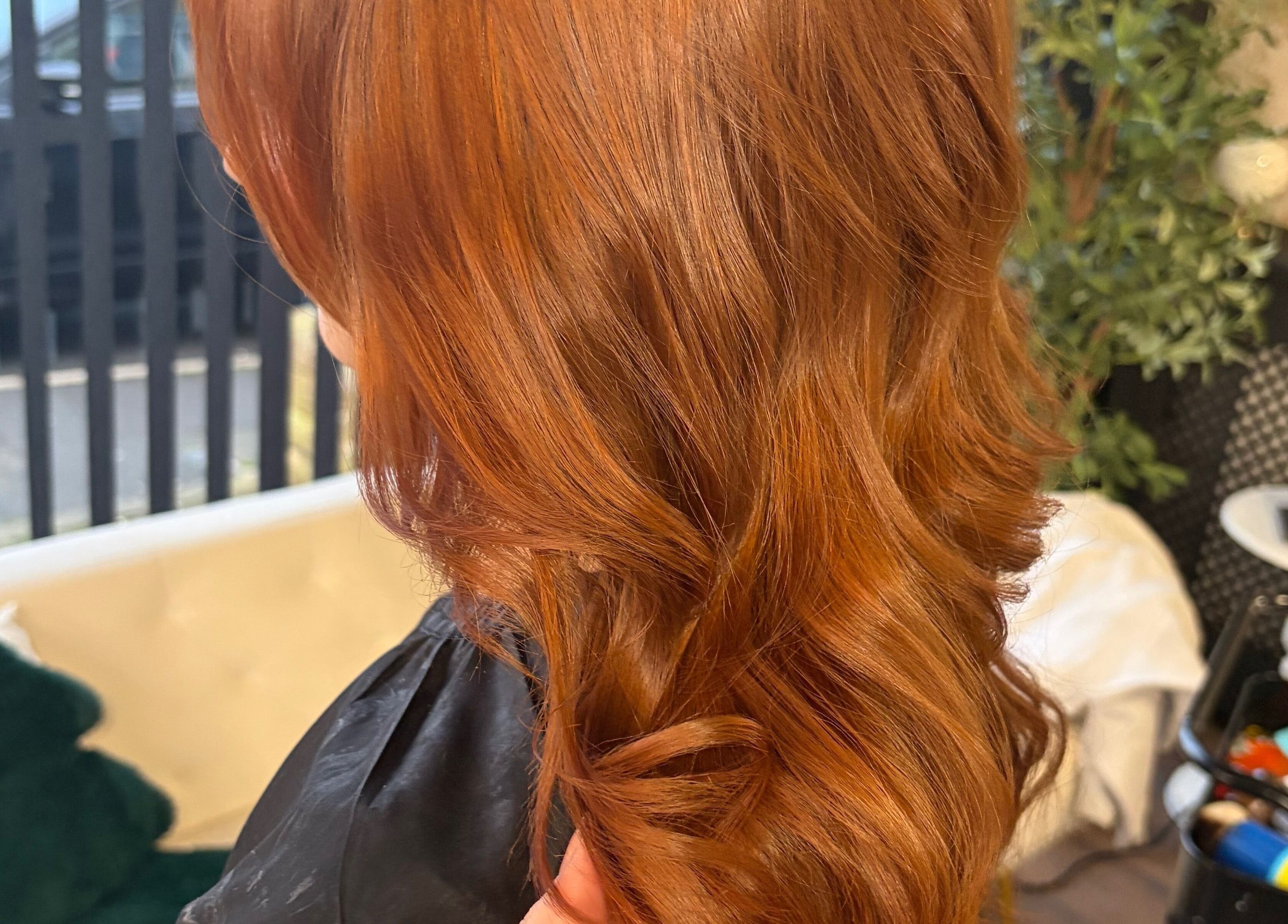 Stunning ginger curls styled at 133 by el ltd in Dewsbury, England, GB create a vibrant look.