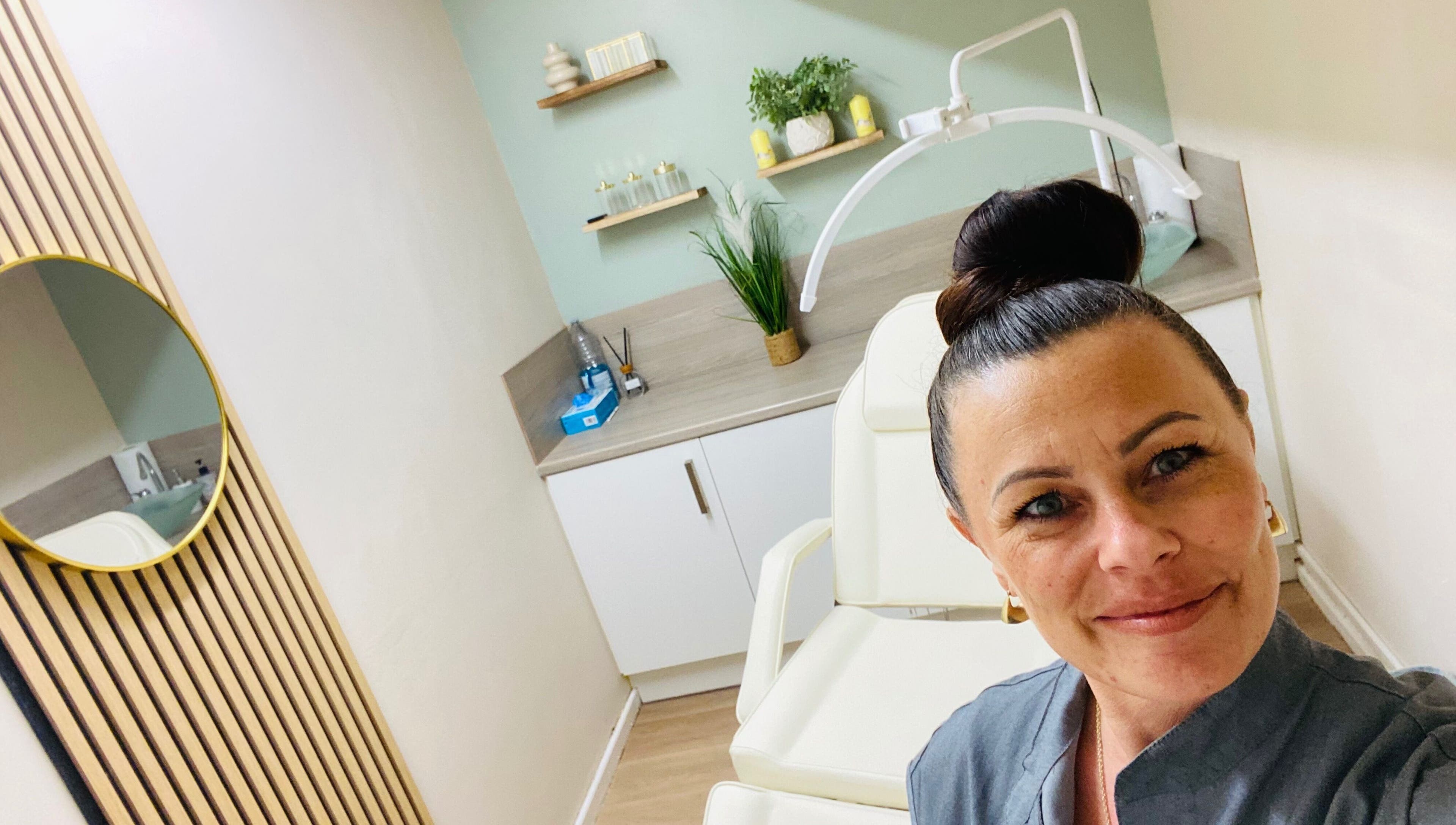 Relaxing treatment room at Neat Nurse, Talbot Green, Wales, GB, showcasing modern design and comfort.