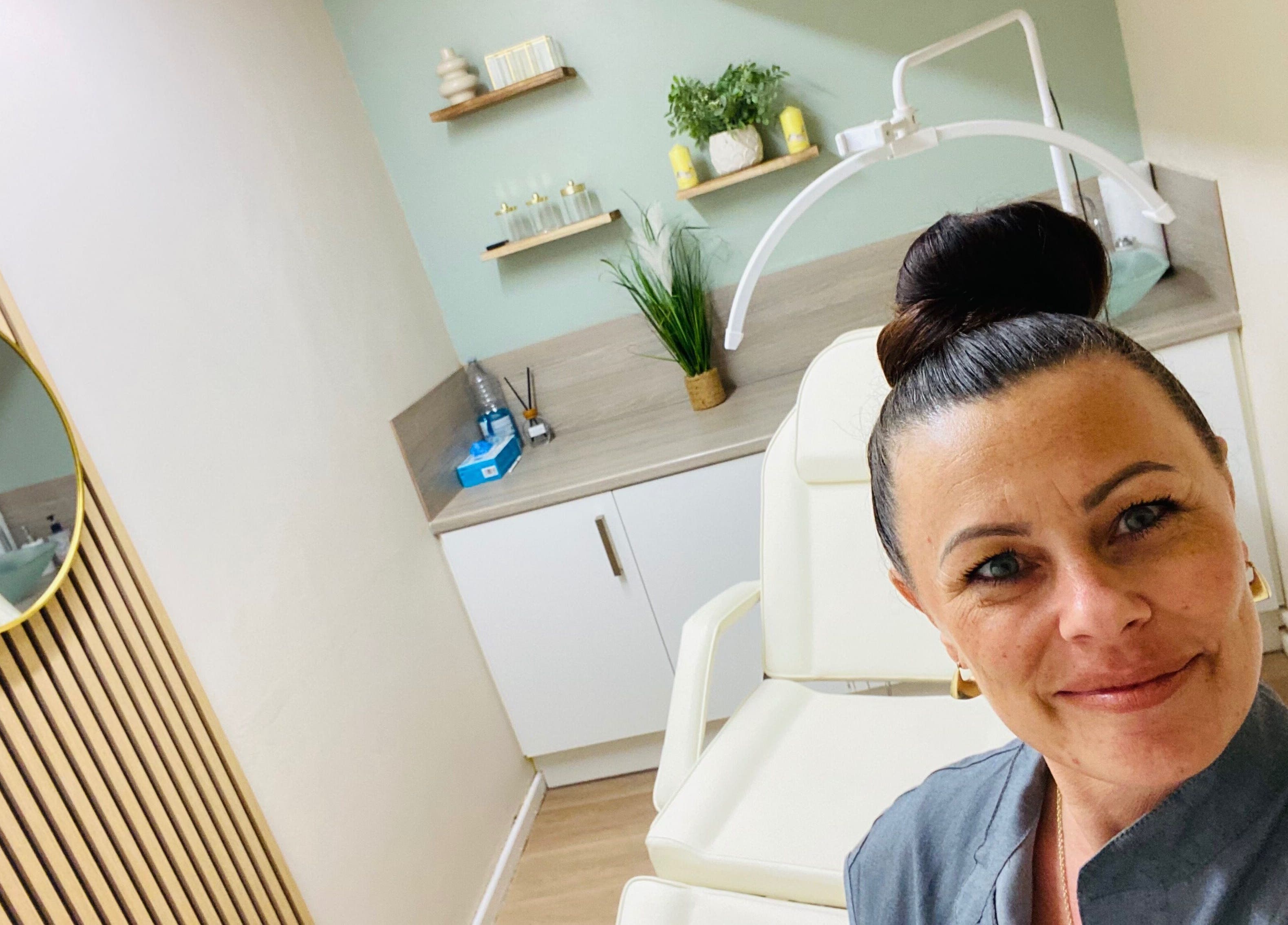 Relaxing treatment room at Neat Nurse, Talbot Green, Wales, GB, showcasing modern design and comfort.