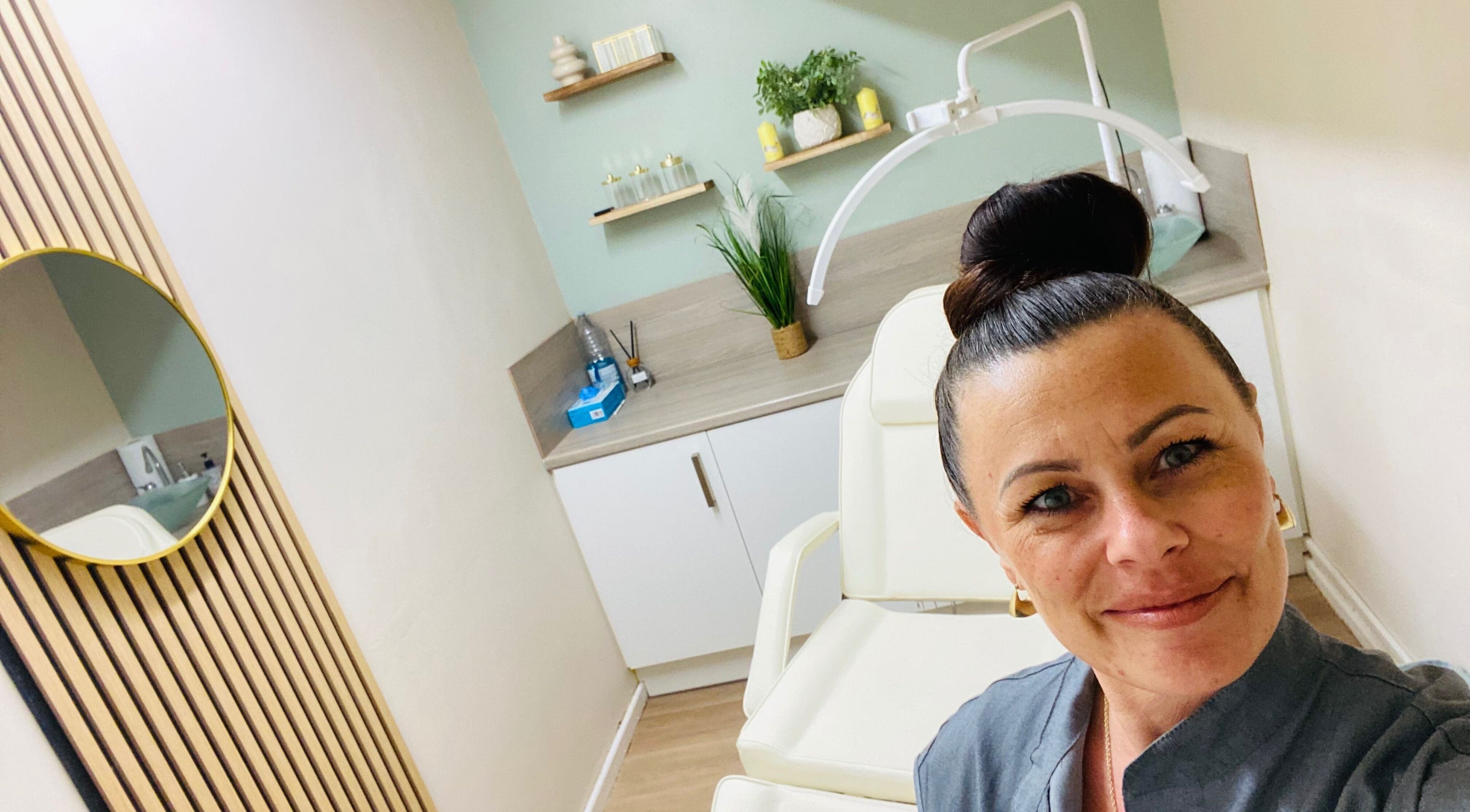 Relaxing treatment room at Neat Nurse, Talbot Green, Wales, GB, showcasing modern design and comfort.