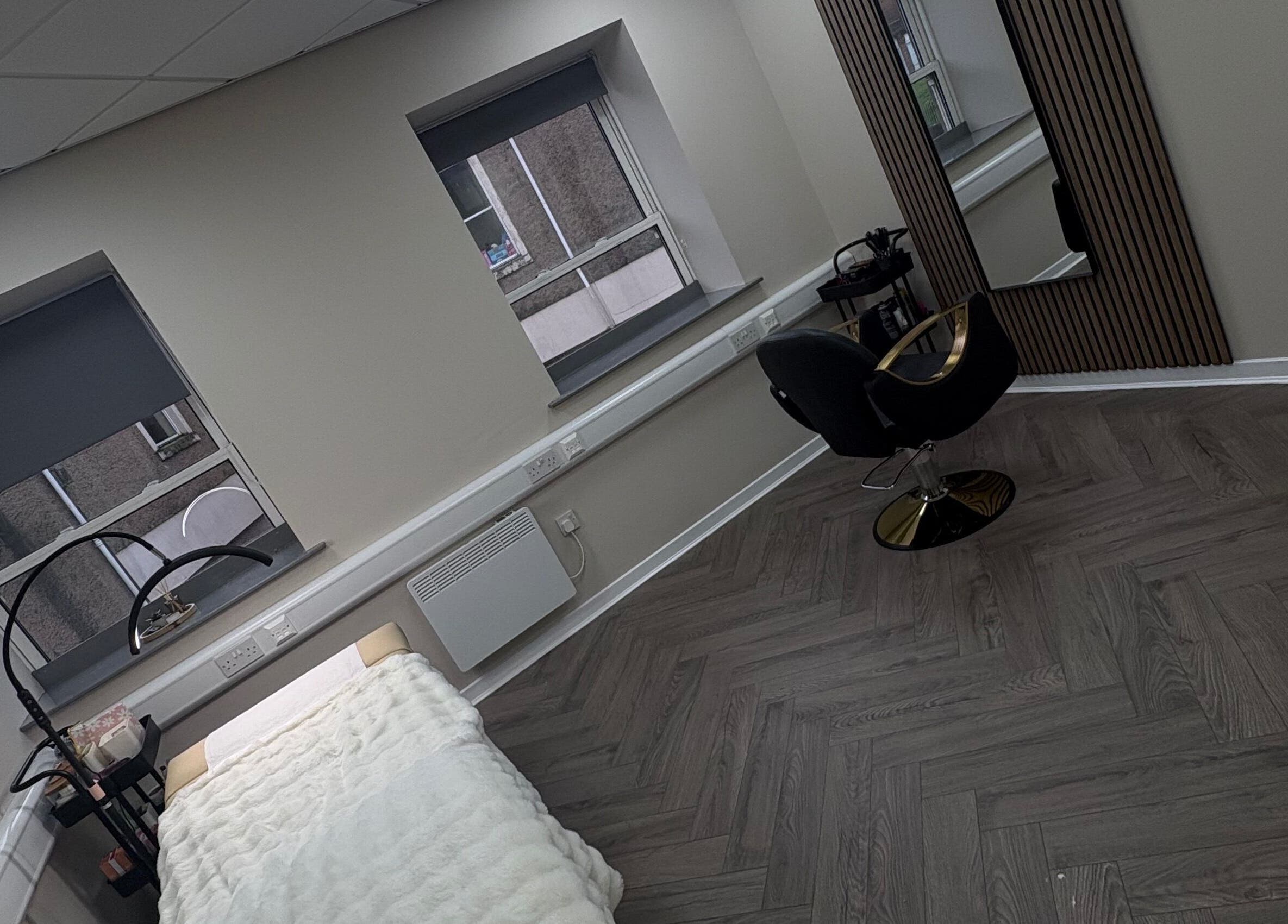 Chic salon space at Abuela in Kilmarnock, Scotland, GB featuring stylish chair and serene ambiance.