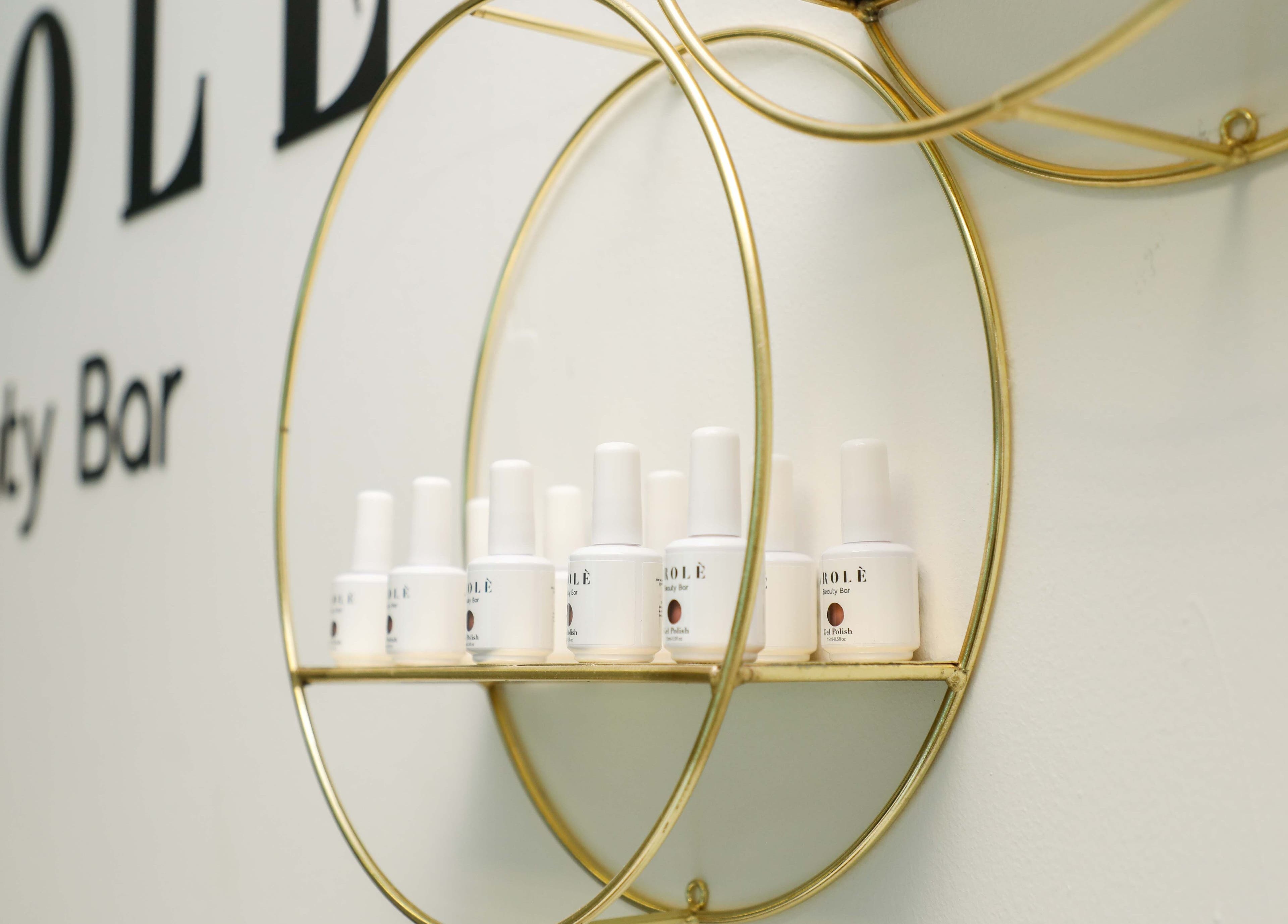 Elegant gold shelves with Arolè Beauty products in Gaborone, Gaborone, BW.