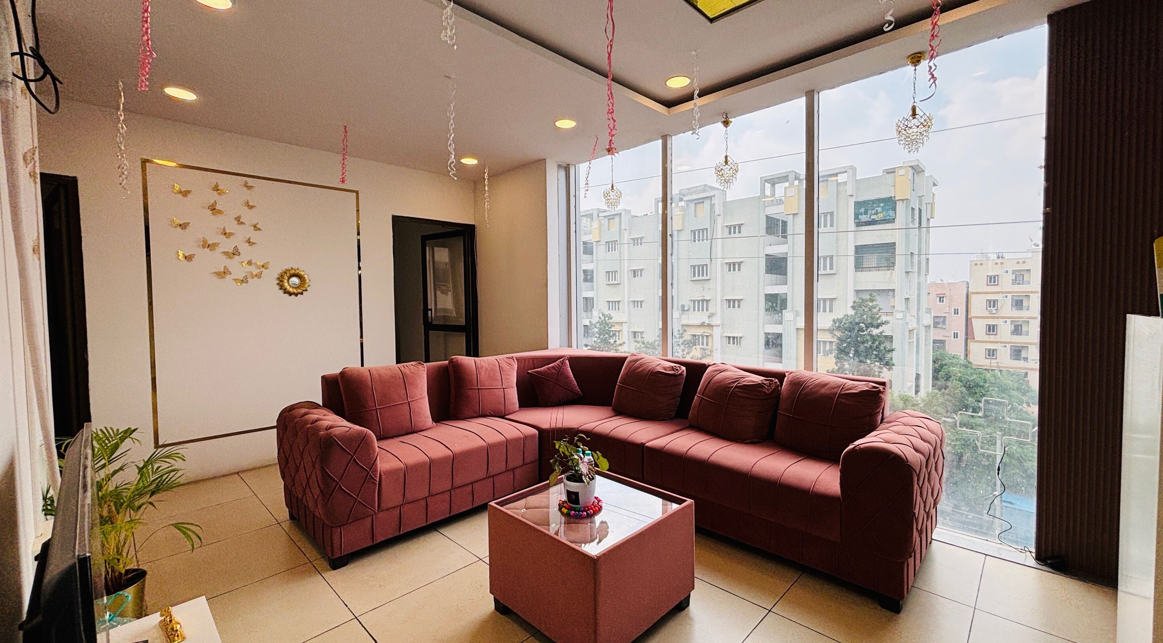 Spacious lounge area at Dr.Akhilas Aesthetics, Hyderabad, Telangana, IN, featuring modern decor and natural light.