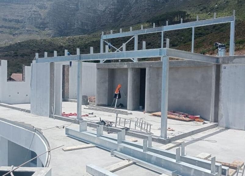 Under-construction modern venue at The Masseur Guys, Cape Town, Western Cape, ZA, offering panoramic views.