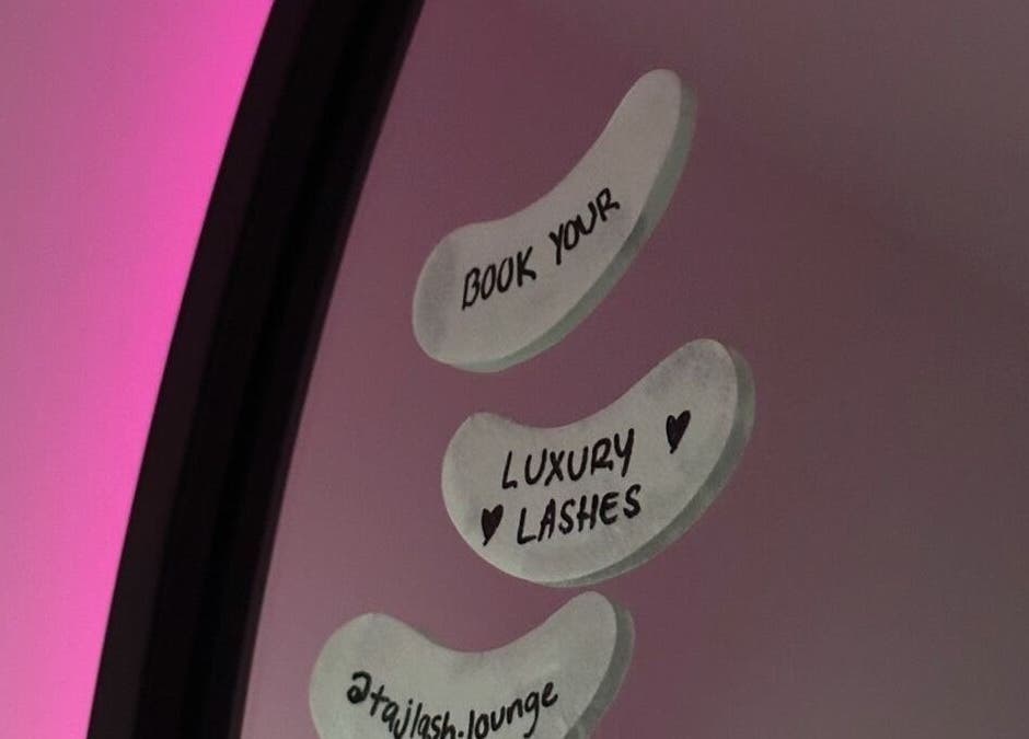 Mirror notes at lashedby_patral, Ikeja, Lagos, NG promoting luxury lashes and bookings.