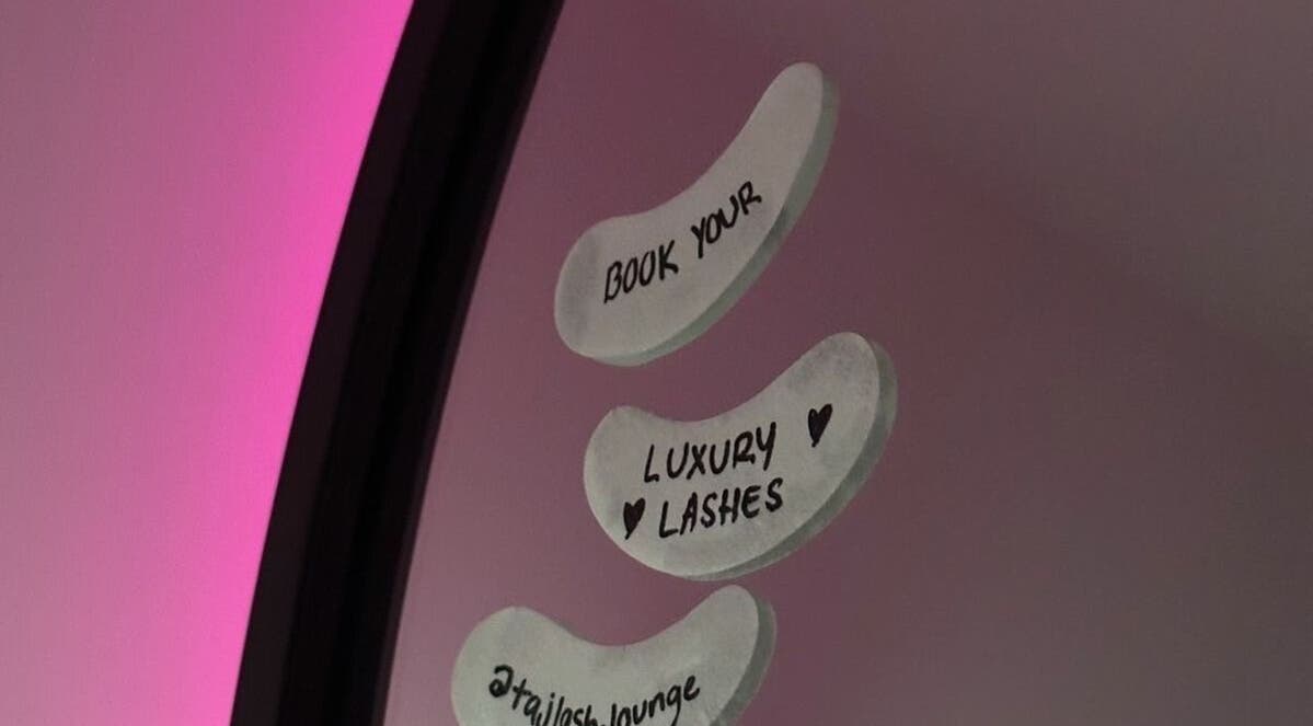 Mirror notes at lashedby_patral, Ikeja, Lagos, NG promoting luxury lashes and bookings.