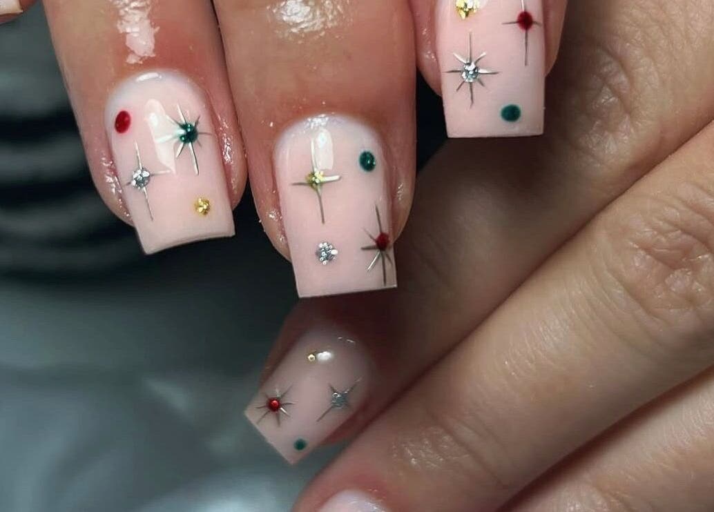 Elegant starry nail art at Nailed It - By Vanessa, Bolton, England, GB. Perfectly manicured fingers.