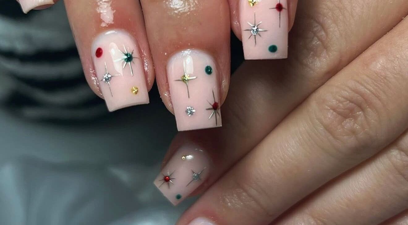 Elegant starry nail art at Nailed It - By Vanessa, Bolton, England, GB. Perfectly manicured fingers.