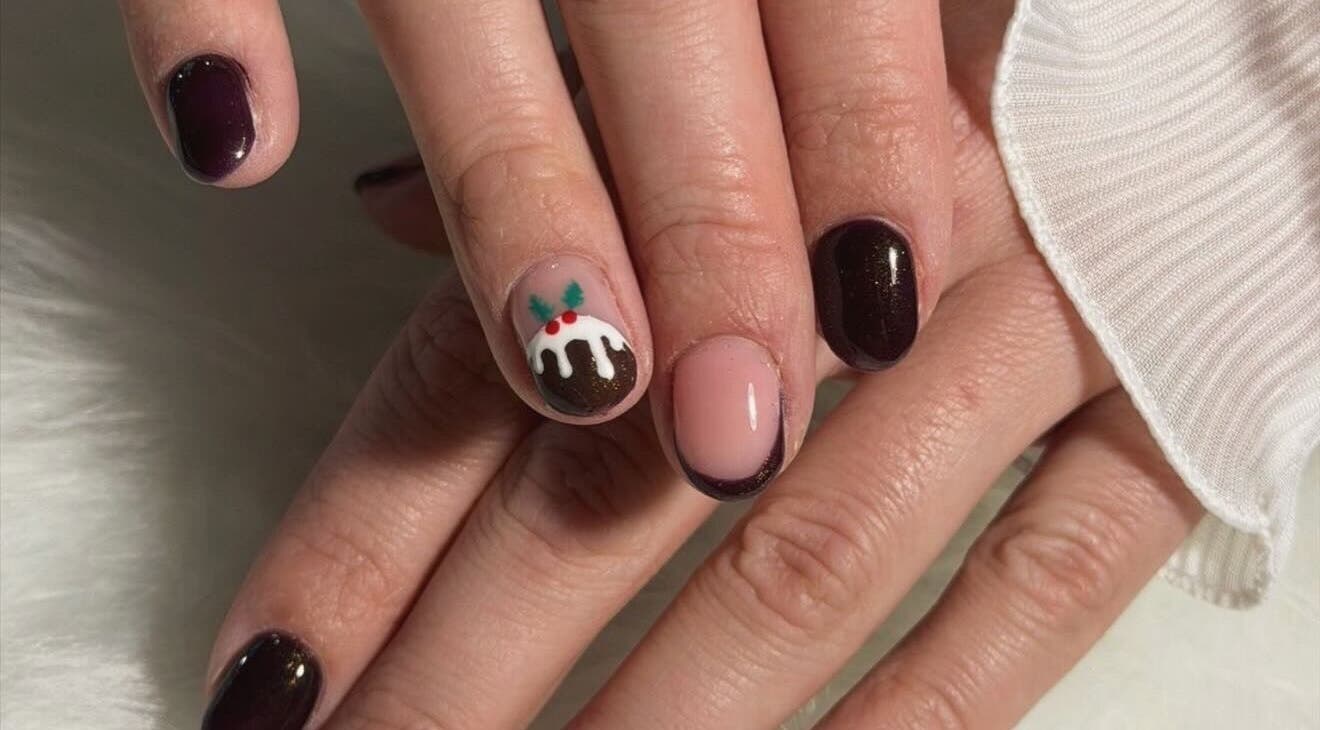 Festive nail art featuring holiday pudding at Nailed It - By Vanessa, Bolton, England, GB.