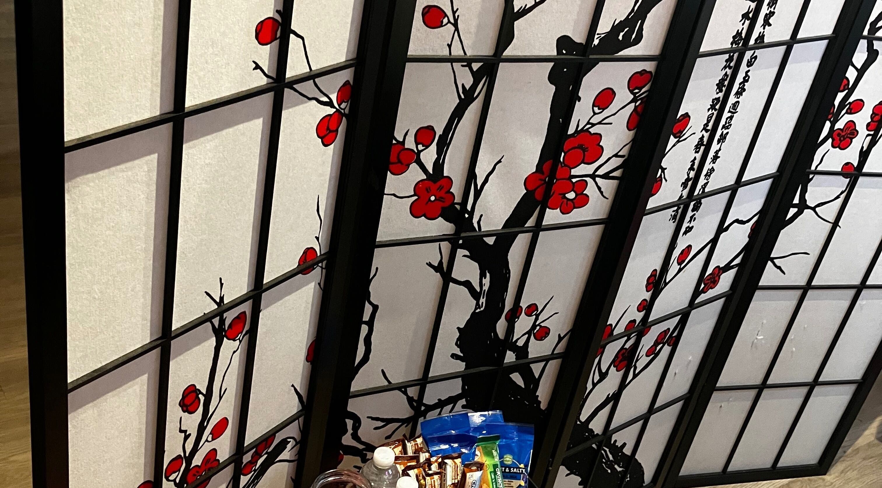 Cherry blossom folding screen at B’LuxRoseLashesllc in Orlando, Florida, US adds elegance to the venue setting.