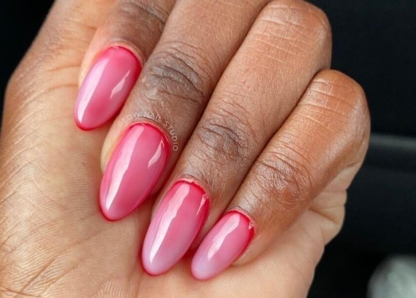 Vibrant pink gel manicure at Glow Nail Studio, Cape Town, Western Cape, ZA. Showcasing elegant nail design.