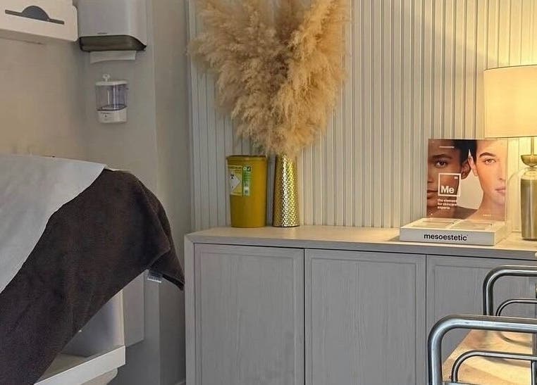 Cozy interior of Sculpted by Jo, Stourbridge, England, GB, featuring treatment area with soft lighting.