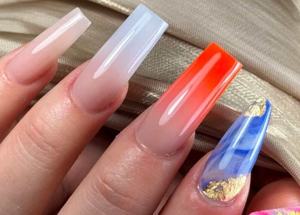 Stylish nail designs at Nail Luxury Salon & Spa Orillia, Orillia, Ontario, CA showcasing vibrant colors and patterns.