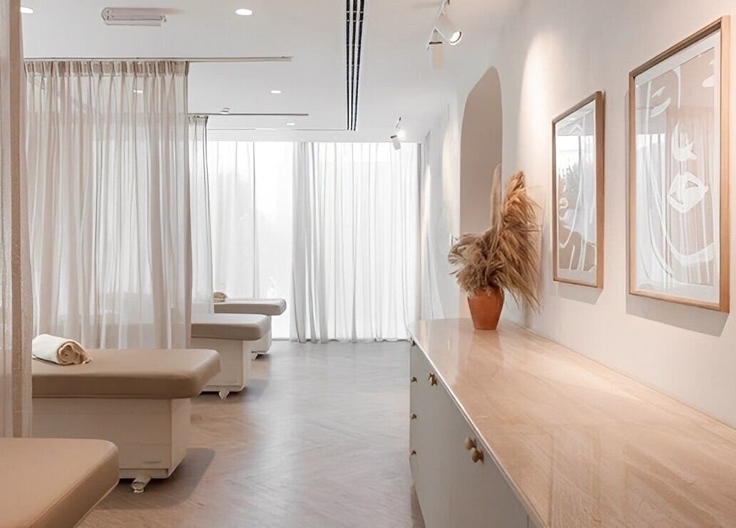 Tranquil spa room at BaharBrows, Dubai, Dubai, AE with soft curtains and calming decor.