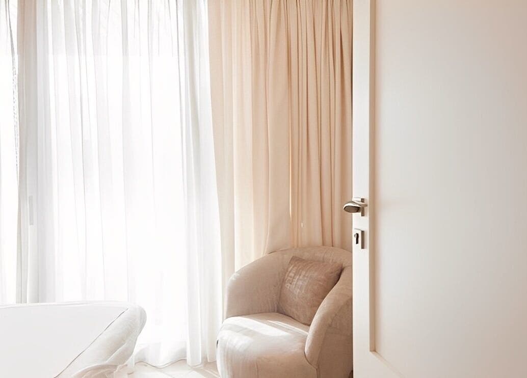 Peaceful spa room at BaharBrows, Dubai, Dubai, AE, featuring soft lighting and cozy seating.