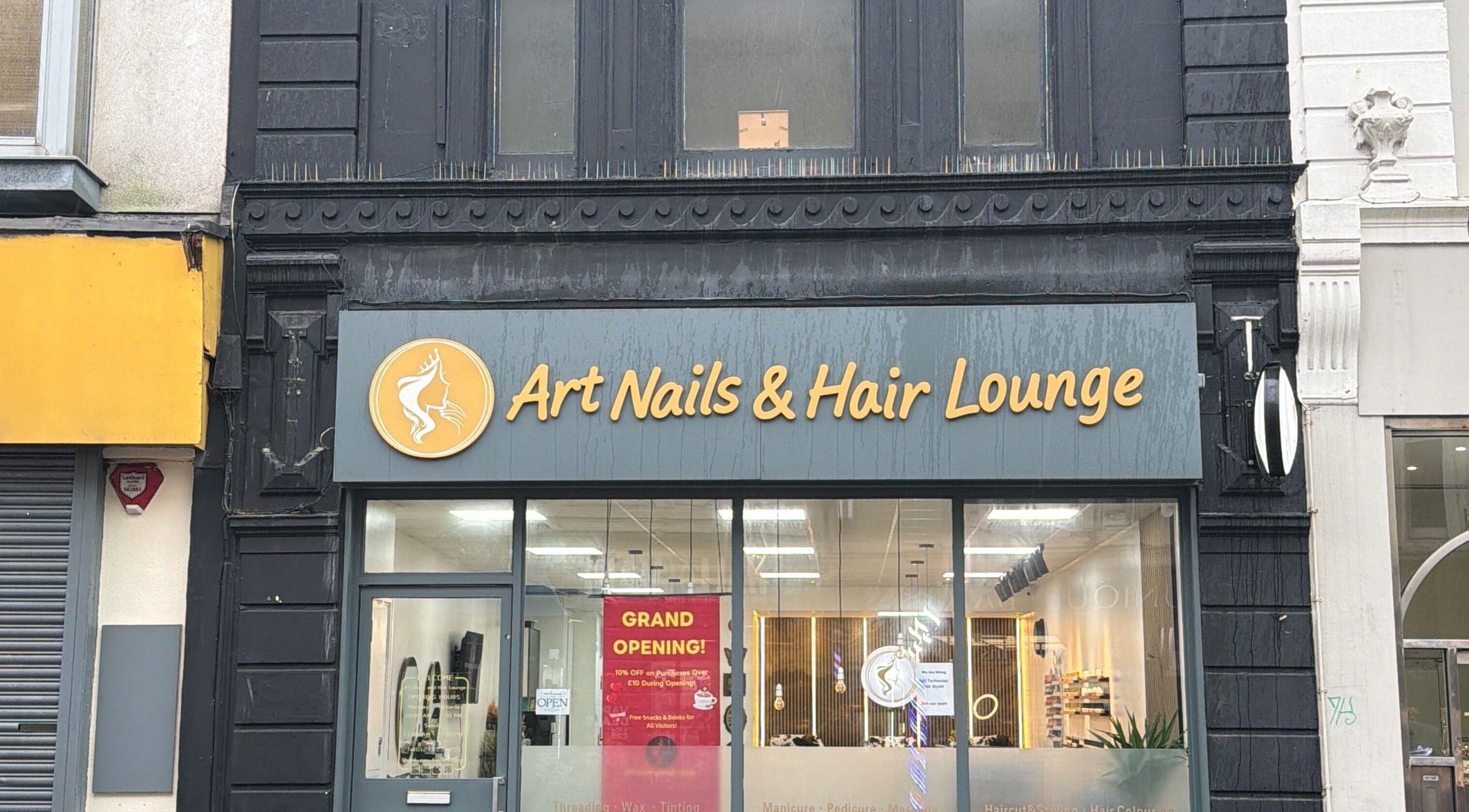 Front view of Art Nails&Hair Lounge, Brighton And Hove, England, GB, showcasing modern salon storefront.